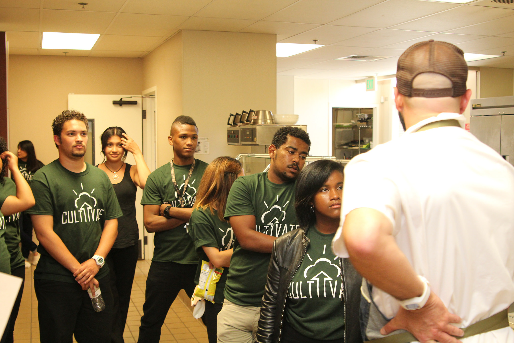 Josh directing student servers at the 2014 UrbanLife Banquet.