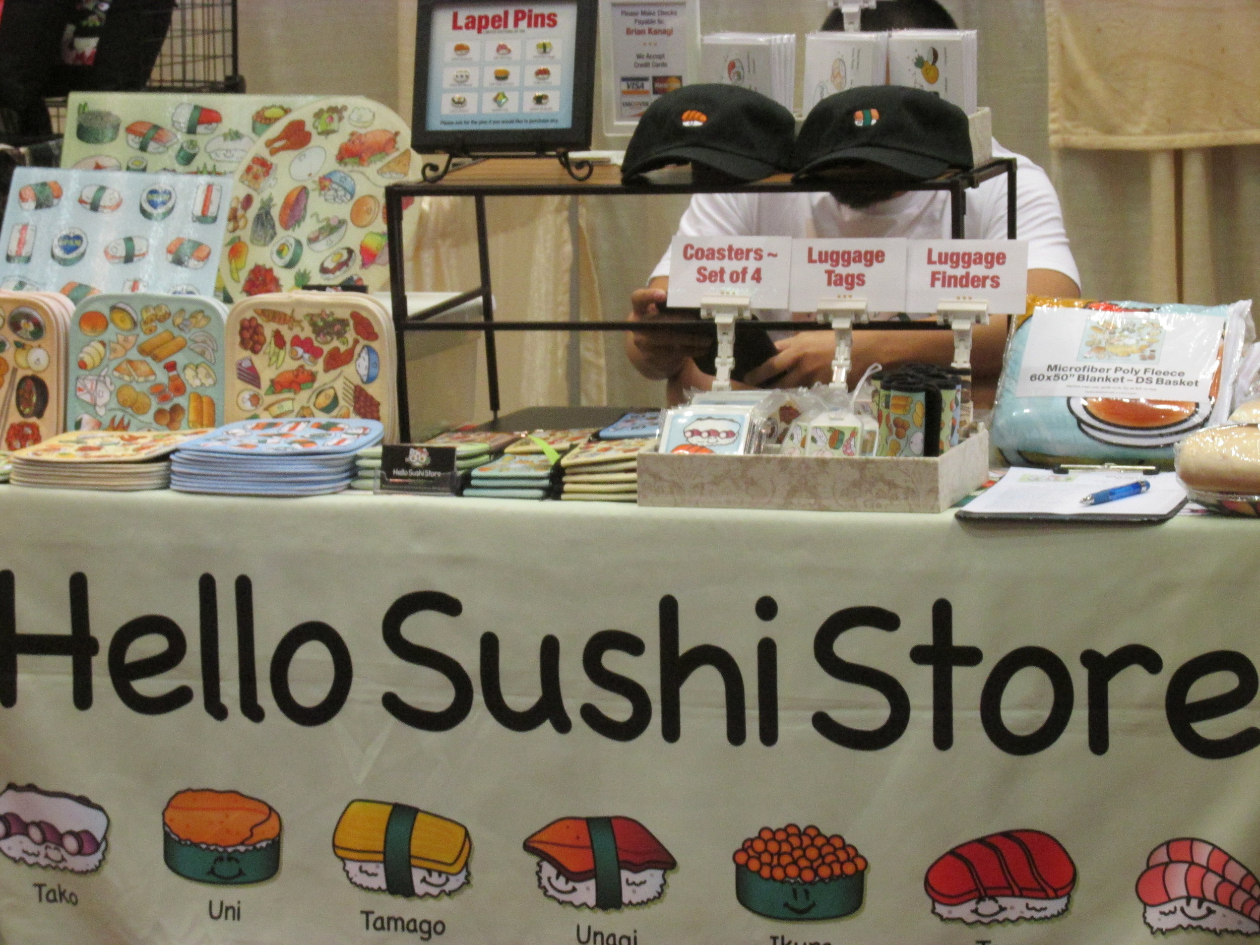 The booth in front of us was Hello Sushi Store.