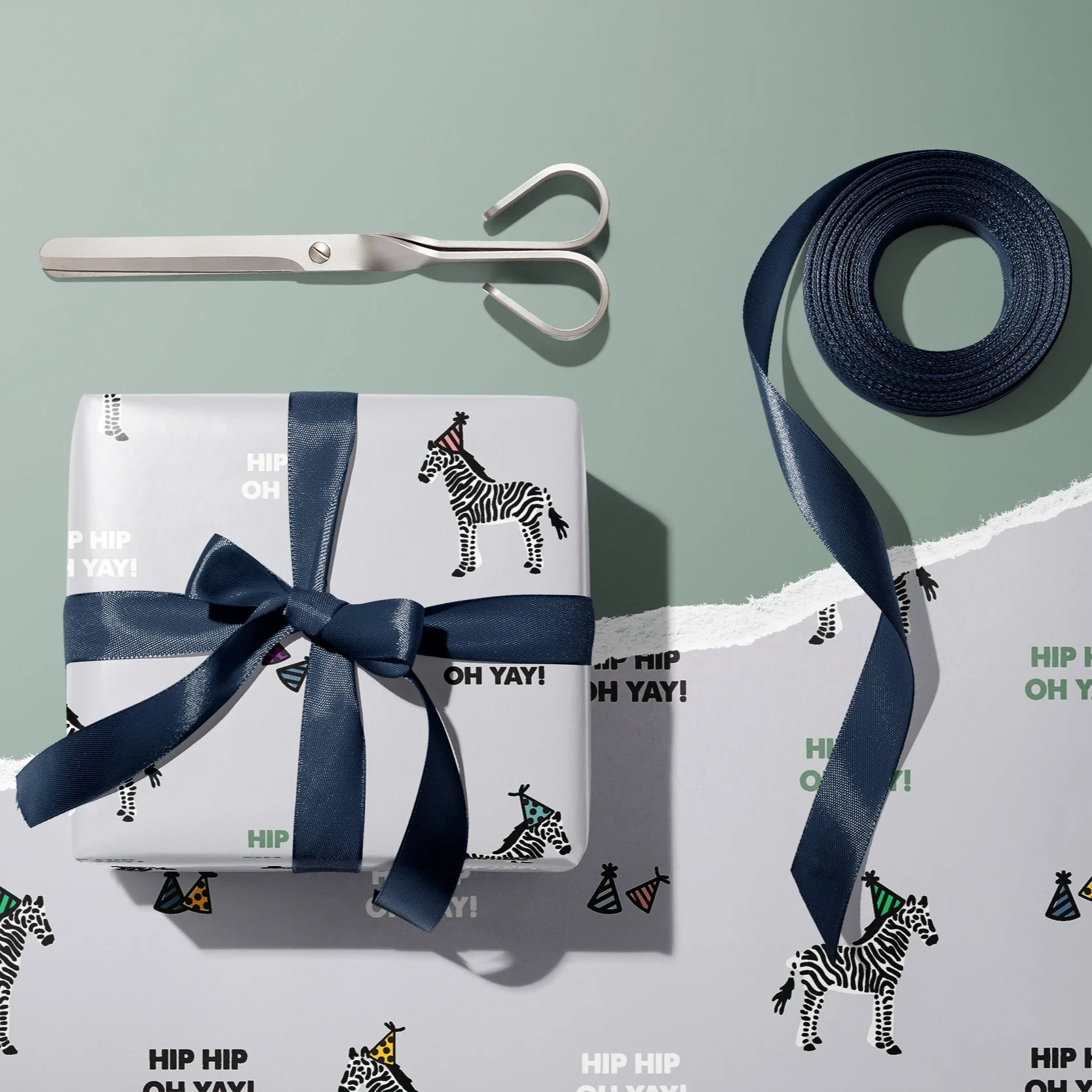 Gift+Box+Wrapping+Paper+Mockup+by+Creatsy+%281%29.jpg