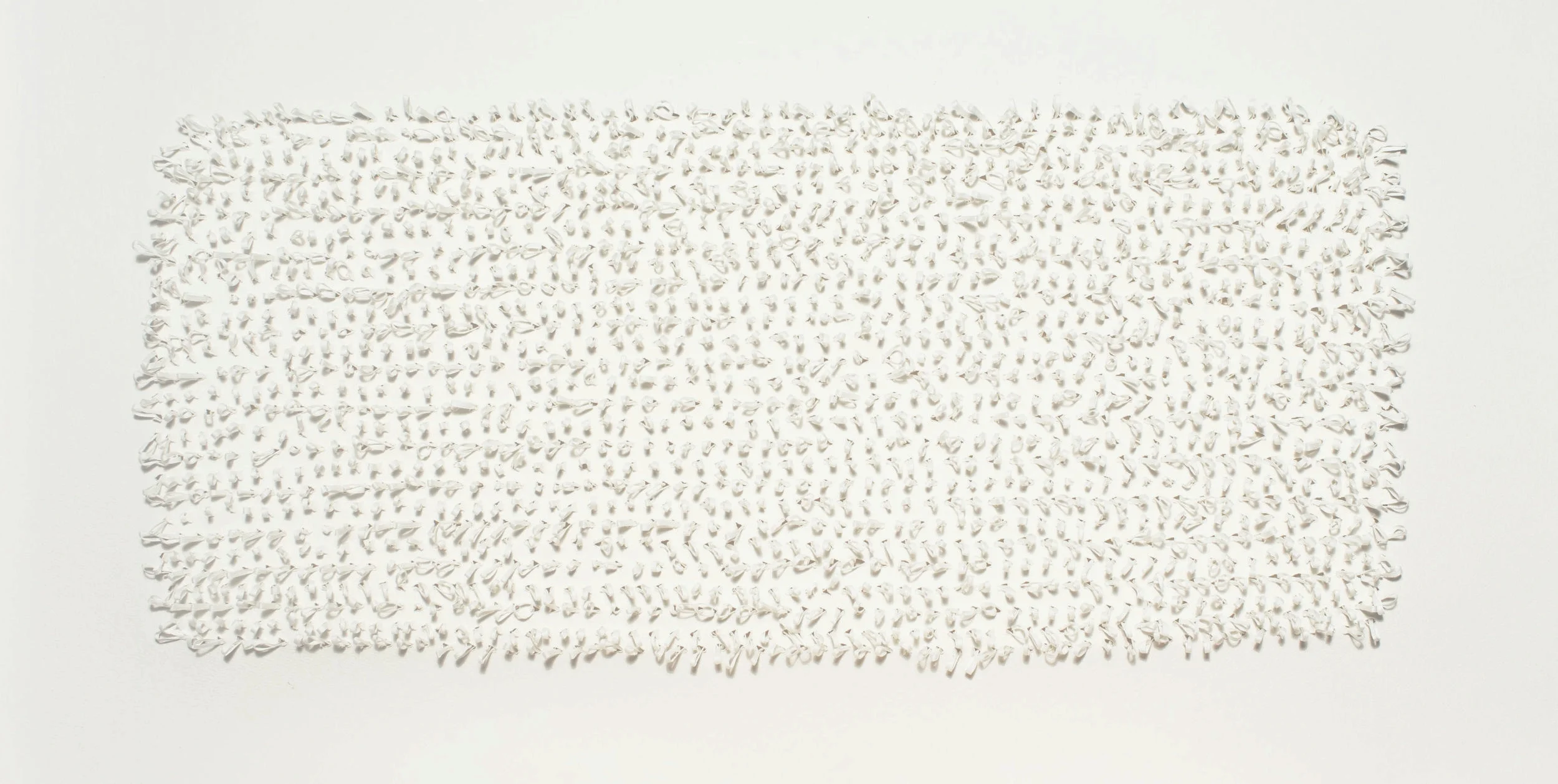 Tufting is a technique traditionally used through open weave fabric for rug making. These 3 dimensional wall pieces are created using the same tufting form through cotton paper. yarn : cotton gima