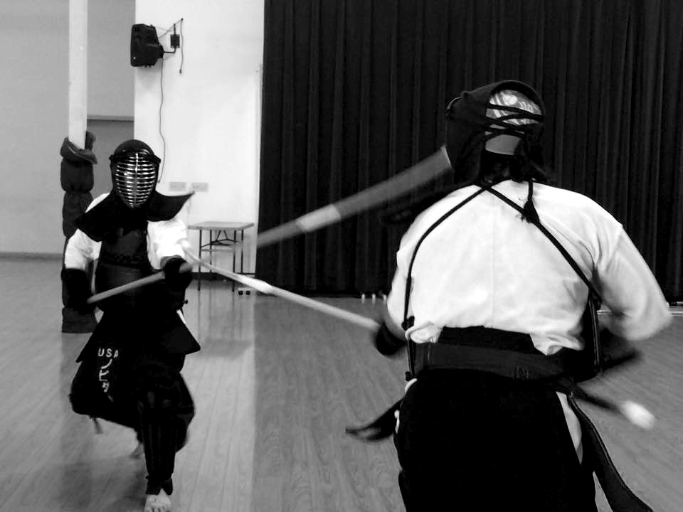 Martin Nobida launches an attack on an opponent's kote .