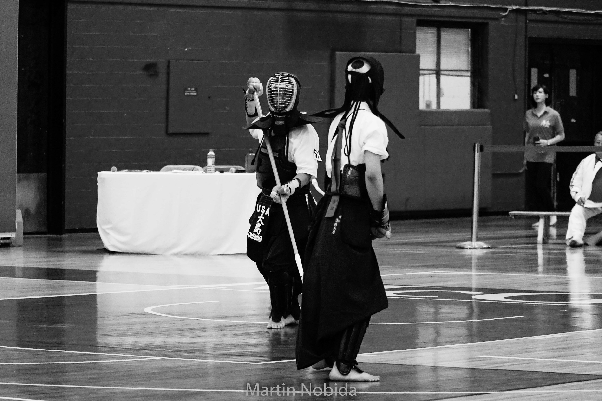Saiyou Ohshima matches with a Japanese competitor at the 2015 International Naginata Federation World Cham