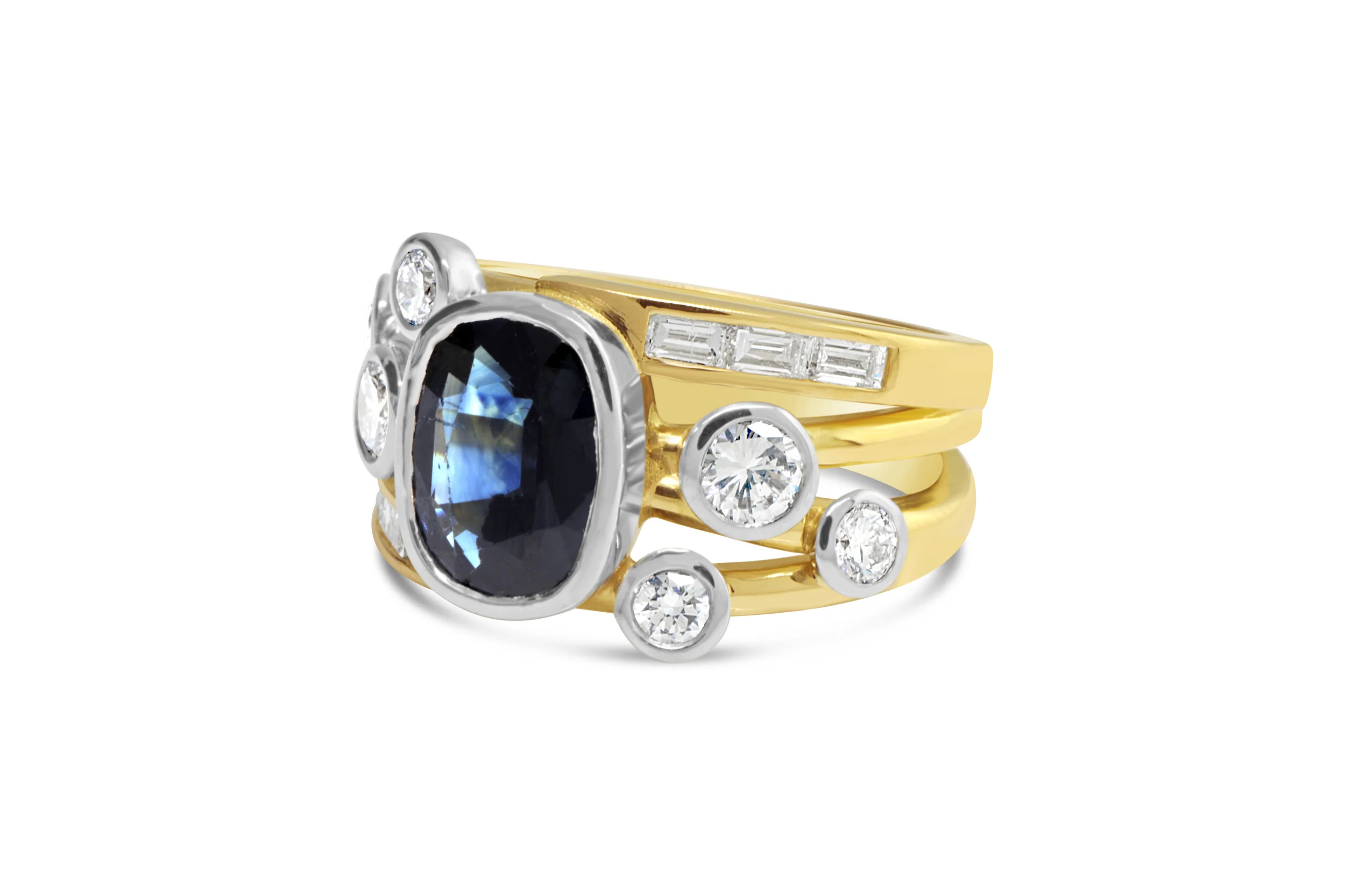 A combination of a few worn out rings into one spectacular creation. Have your next piece of jewellery created just for you using your treasured gemstones.
