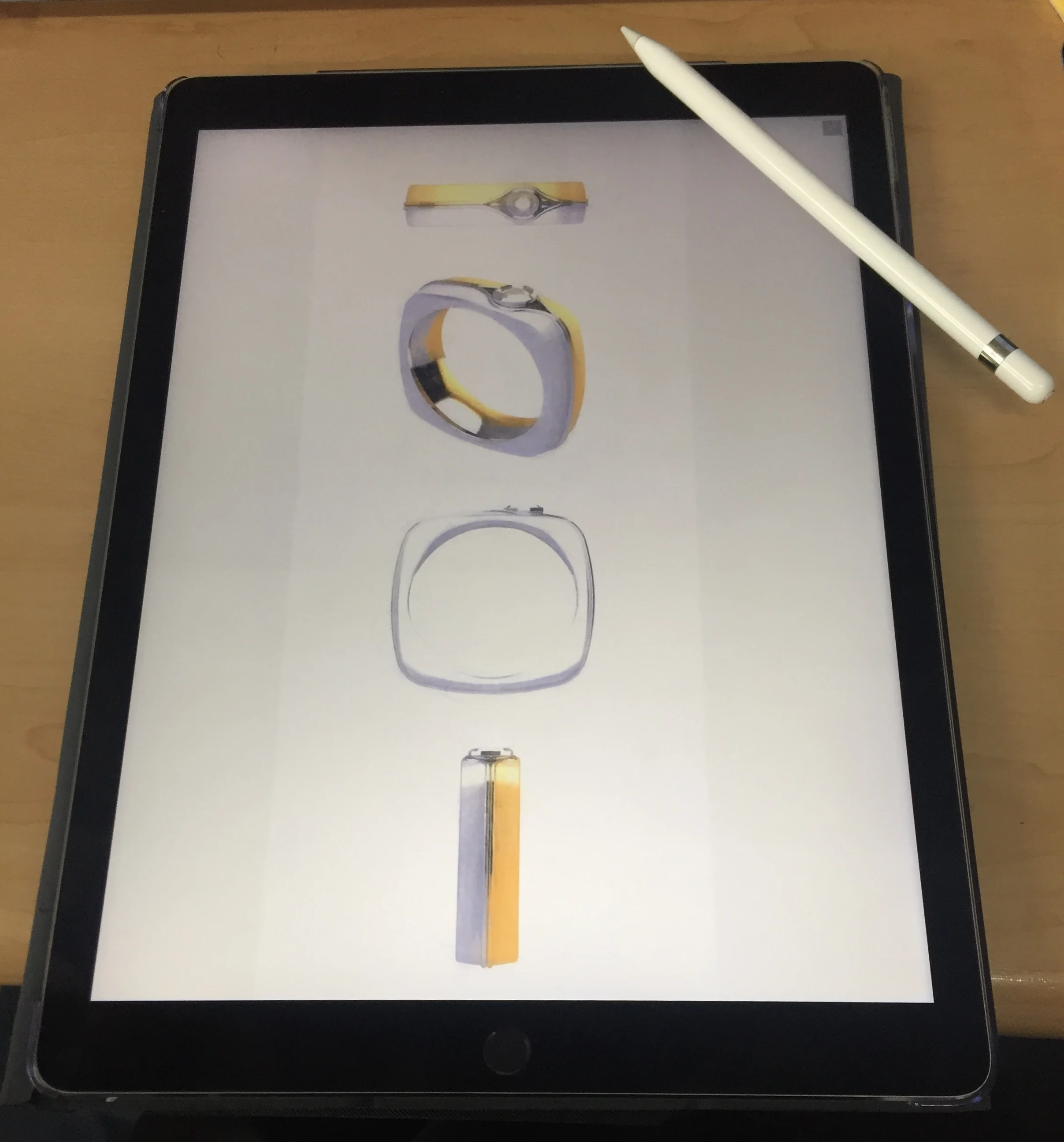 These are concept drawings for a men's wedding band. Our client is going for a square band made in two halves, one white gold and one yellow. Stay tuned for more updates to the creation of this ring. 