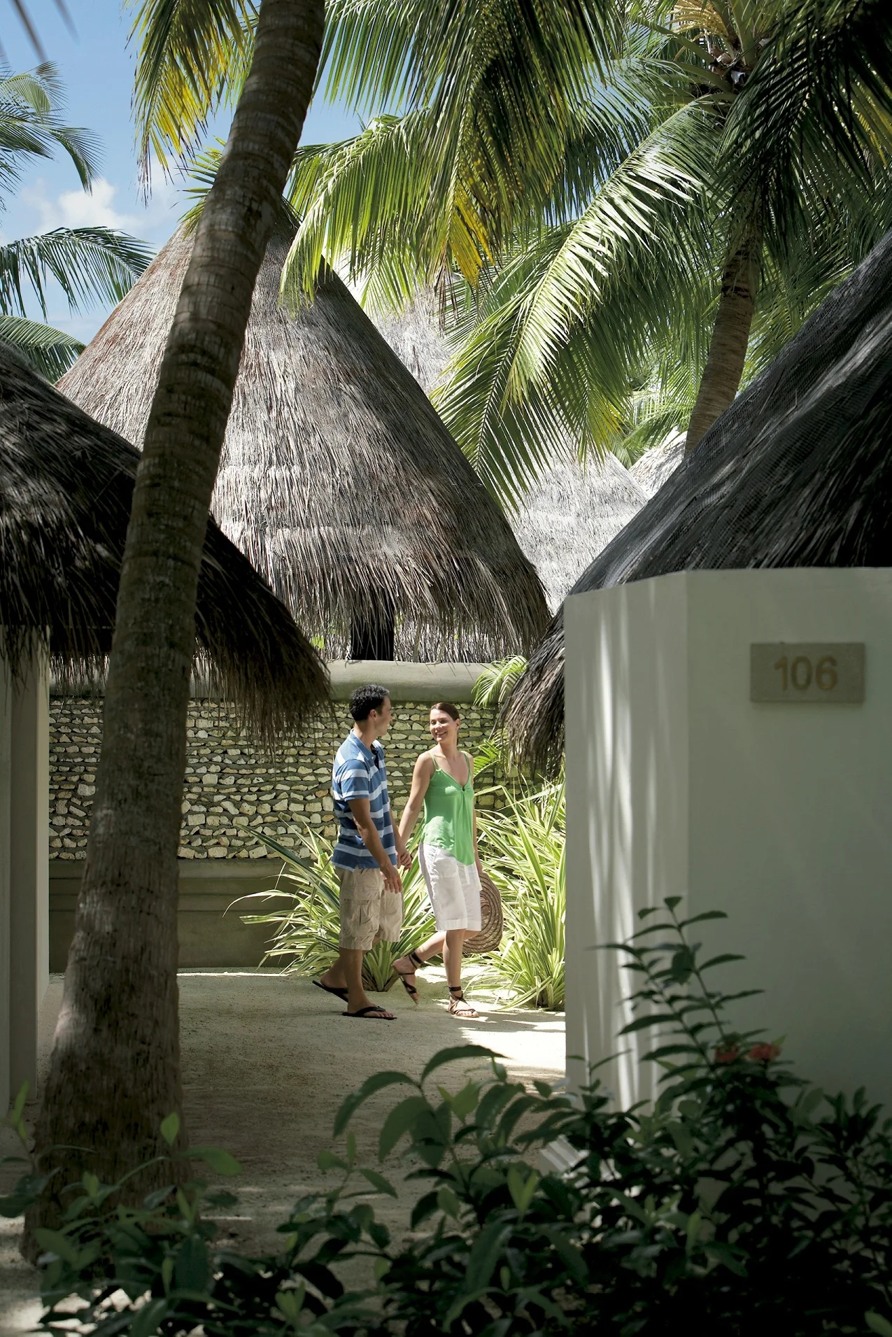 Four Seasons Kuda Huraa Maldives Tropical Garden Villa Walkway.jpg