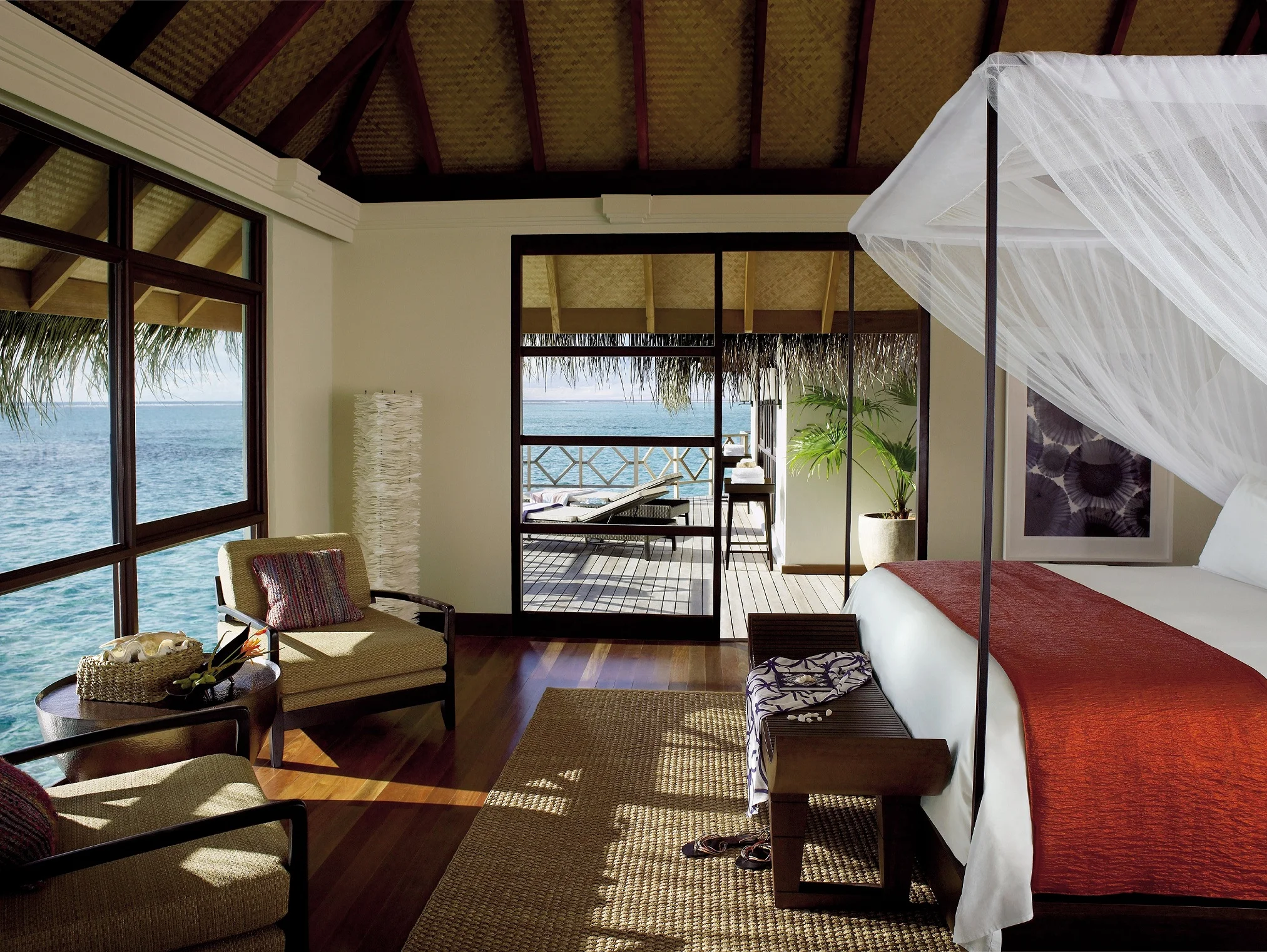 Four Seasons Kuda Huraa Maldives Overwater Bungalow Bedroom Ocean View.jpg