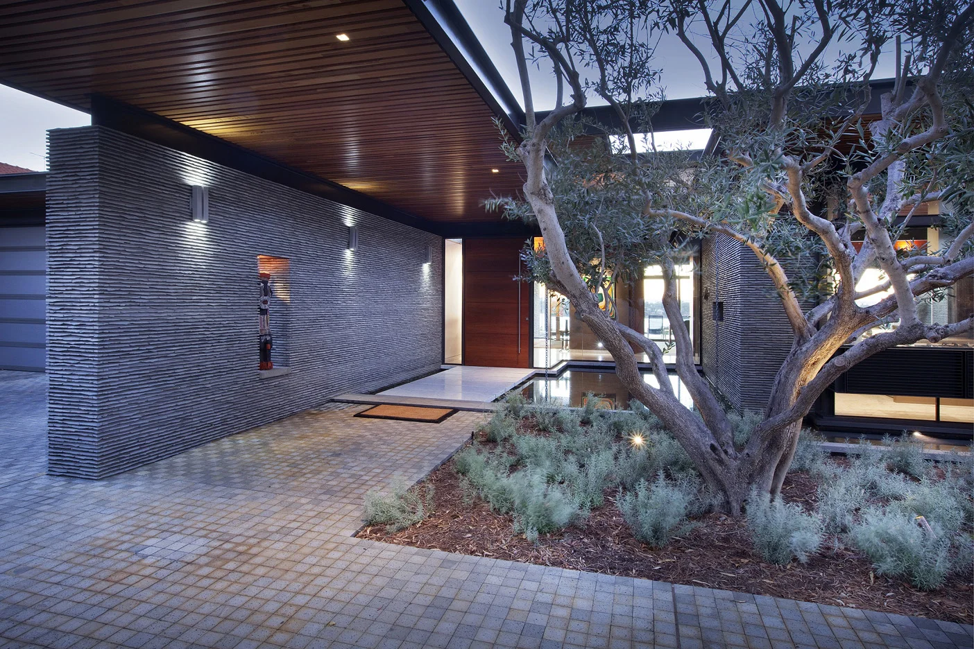 PGR Courtyard Entry Limestone Wall Landscape.jpg