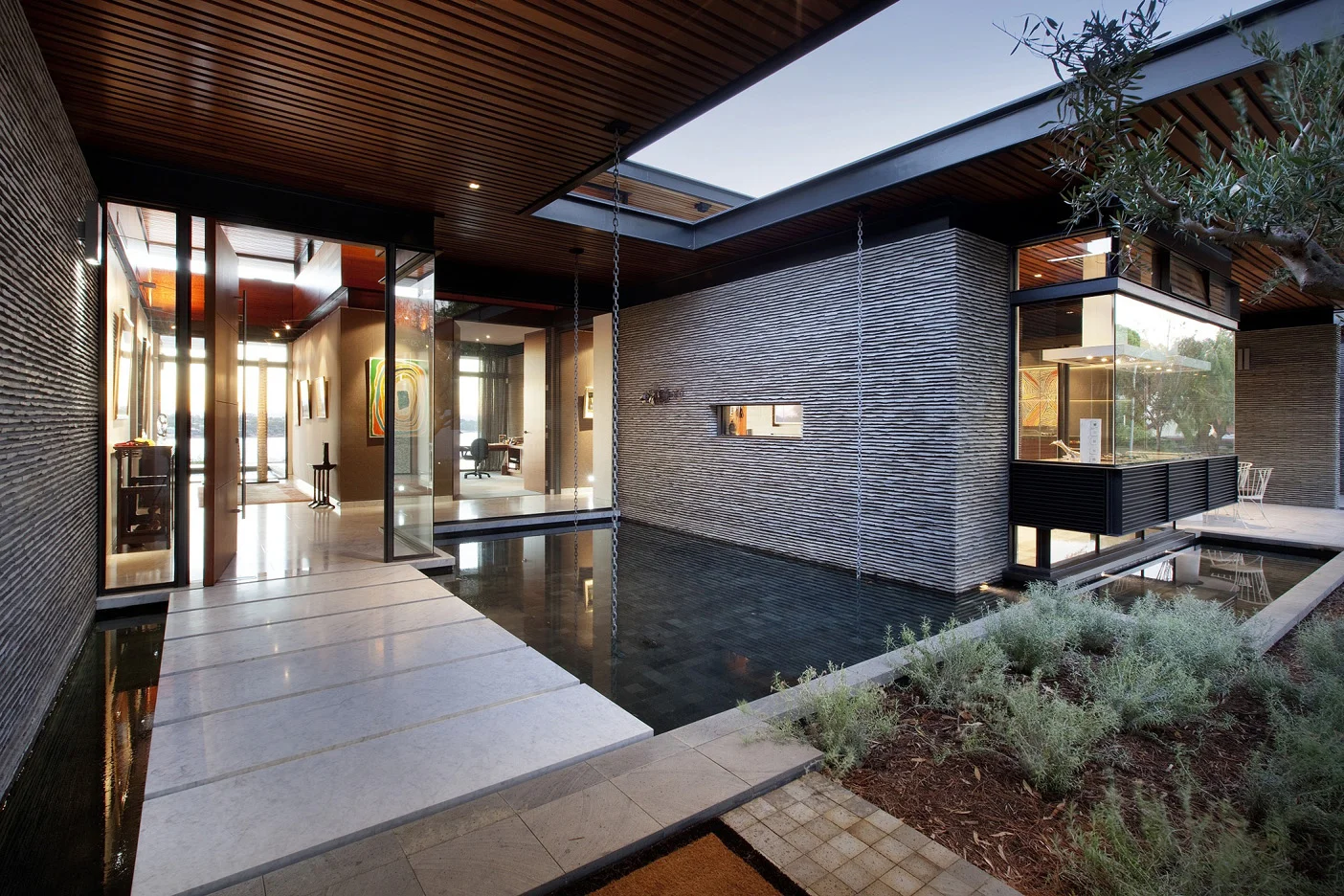PGR Courtyard Water Feature Limestone Wall Residence.jpg