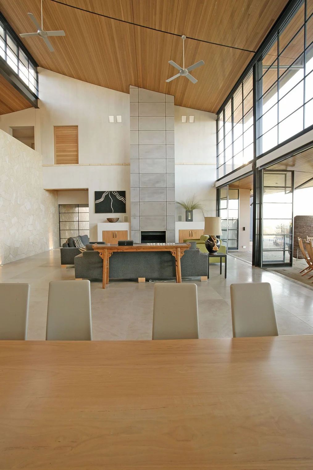 YLR Open Plan Dining Living Limestone Fireplace.jpg
