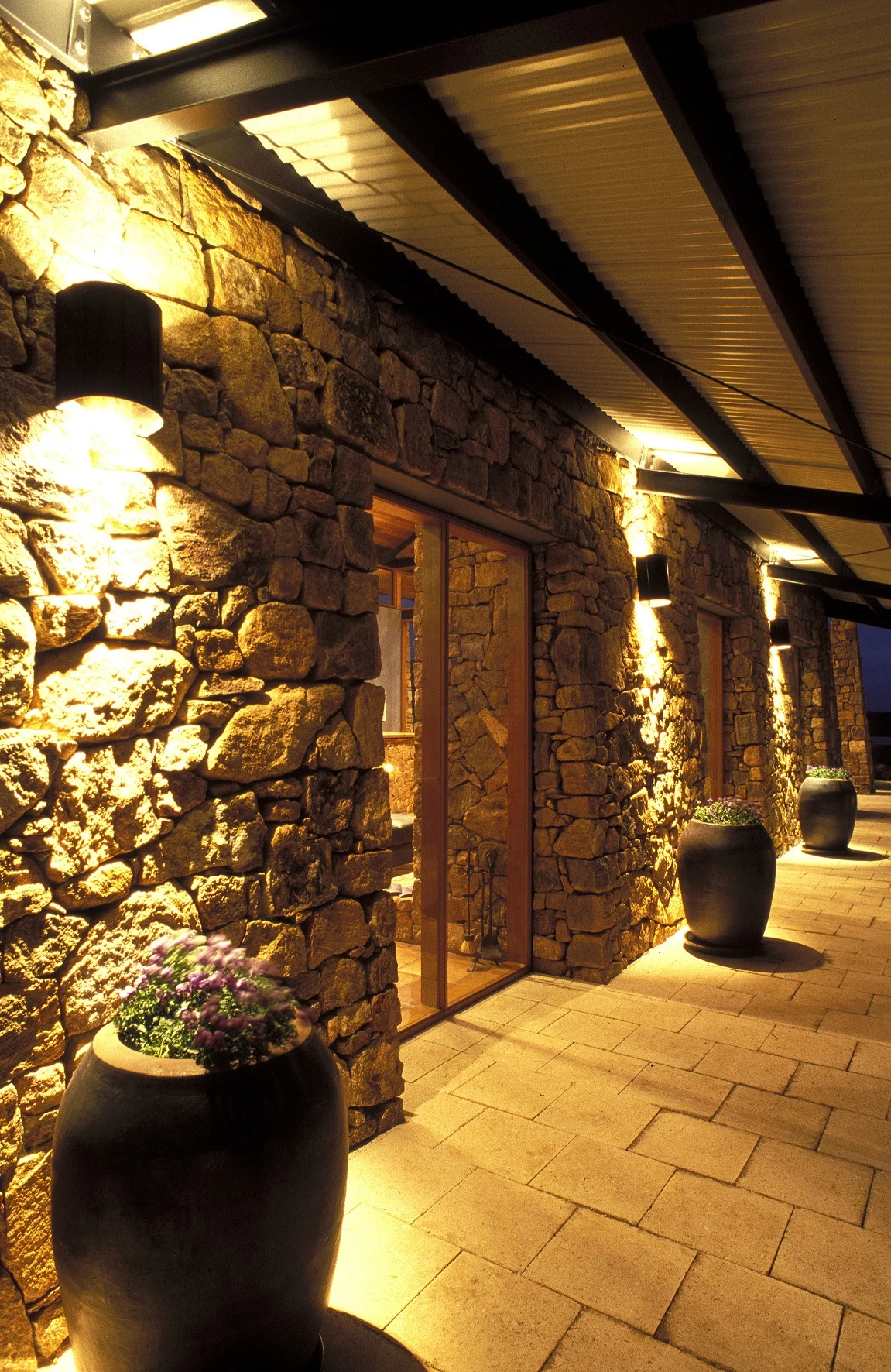 Whispering Sands Residence Stone Wall Entrance.jpg