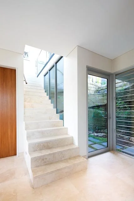 QFR Interior Staircase Sandstone Courtyard View.jpg
