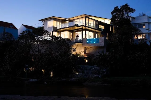 QFR Dusk Exterior Cliffside Residence Pool View.jpg