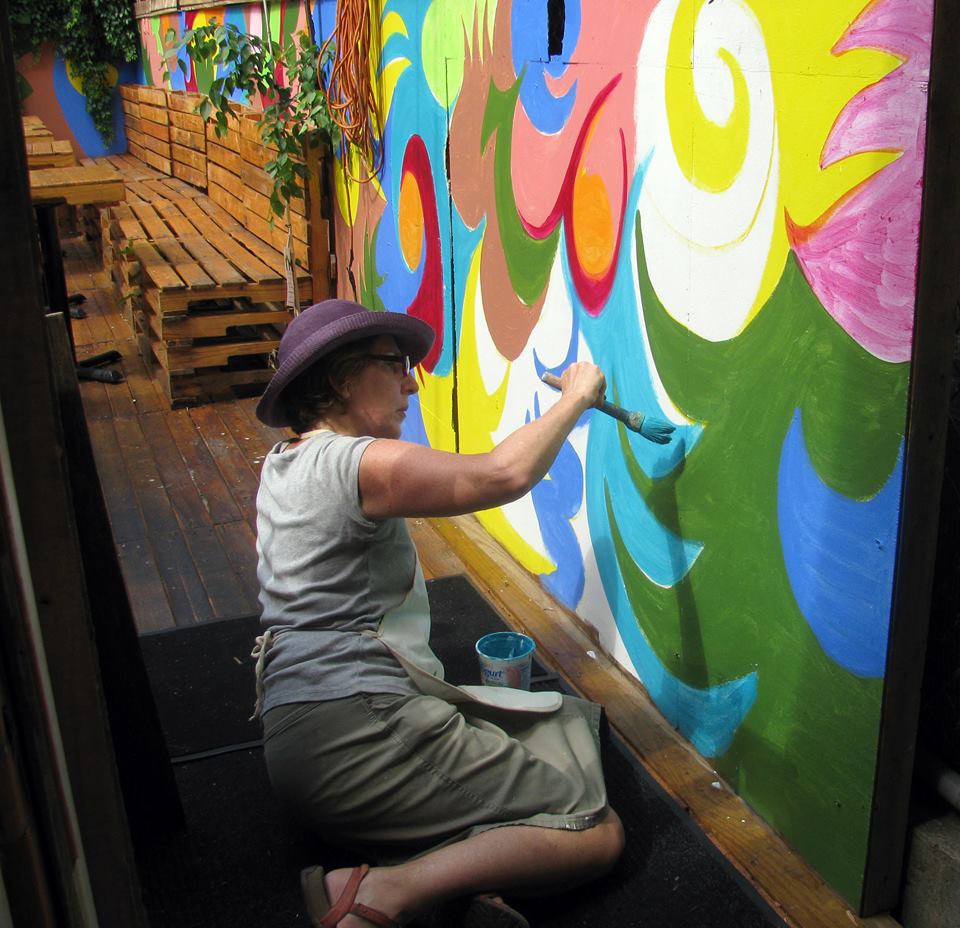 Painting the mural at Mahzen Grill