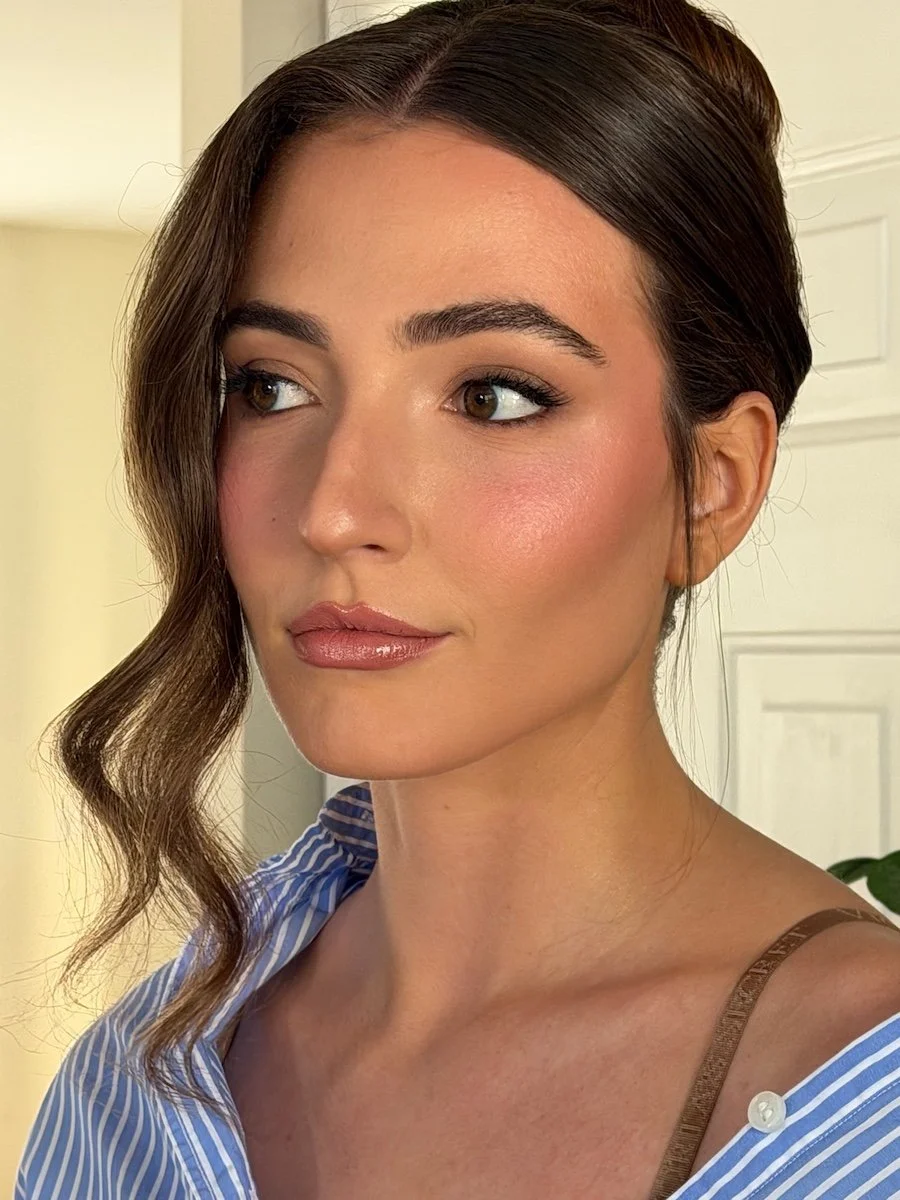 a close up picture of a bridal makeup look on tan skin and brown hair