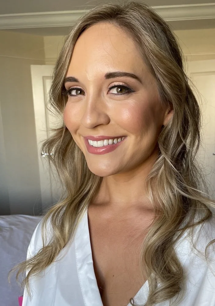soft glam makeup look on a bride with blonde hair