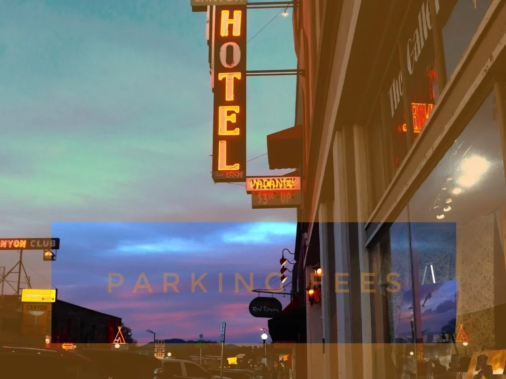 hotel sign lit up in the evening