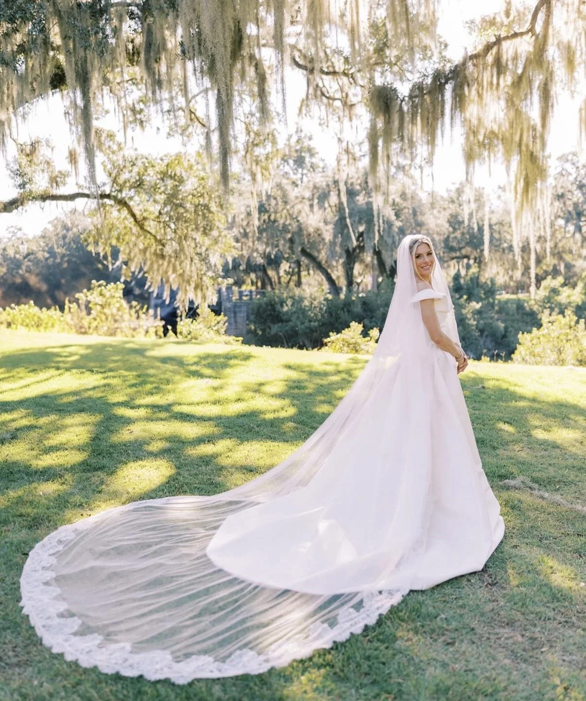 outdoor bridal portrait under a tree with hanging moss