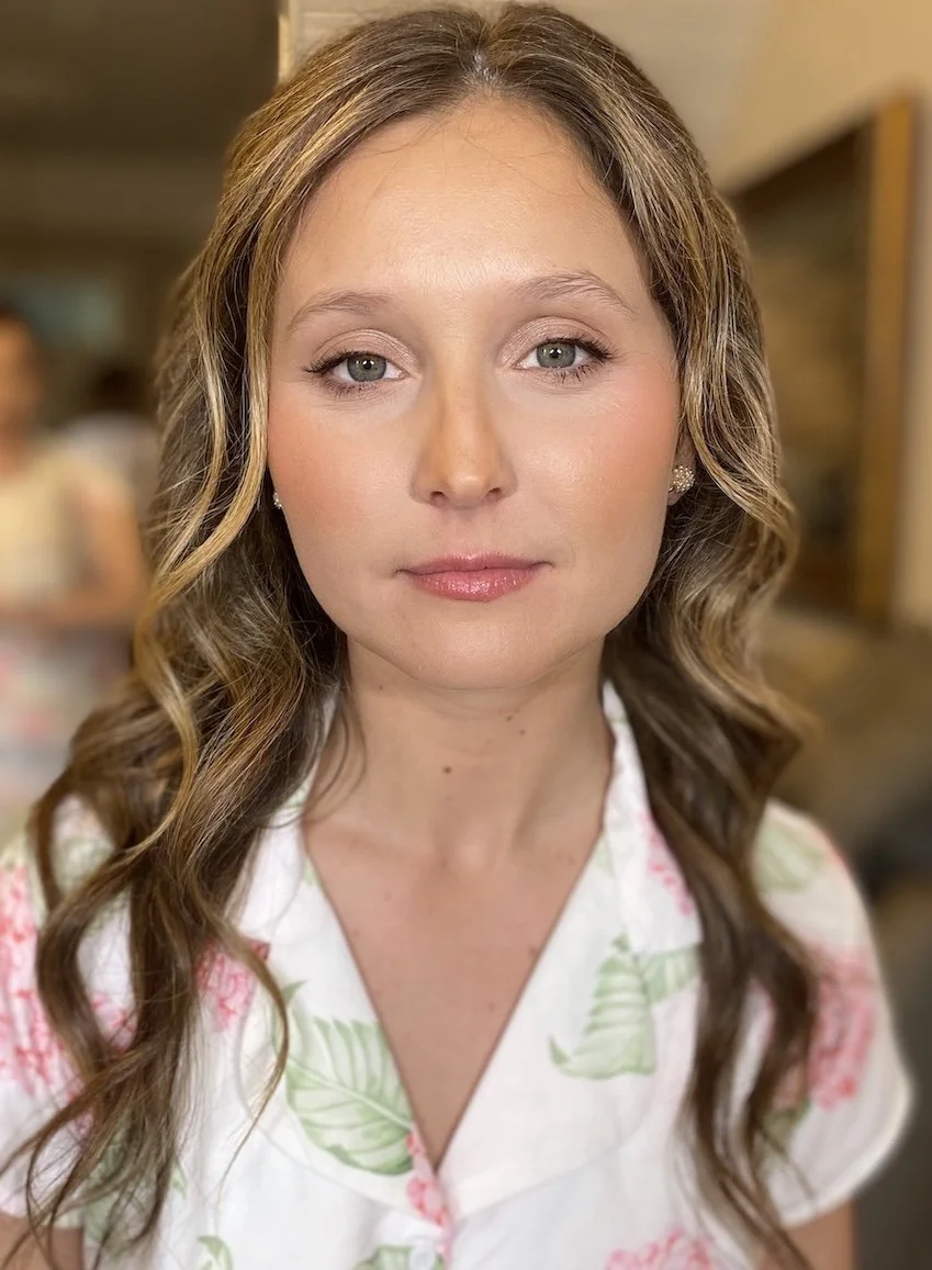 natural makeup application on a bridesmaid with brown hair and hazel eye color