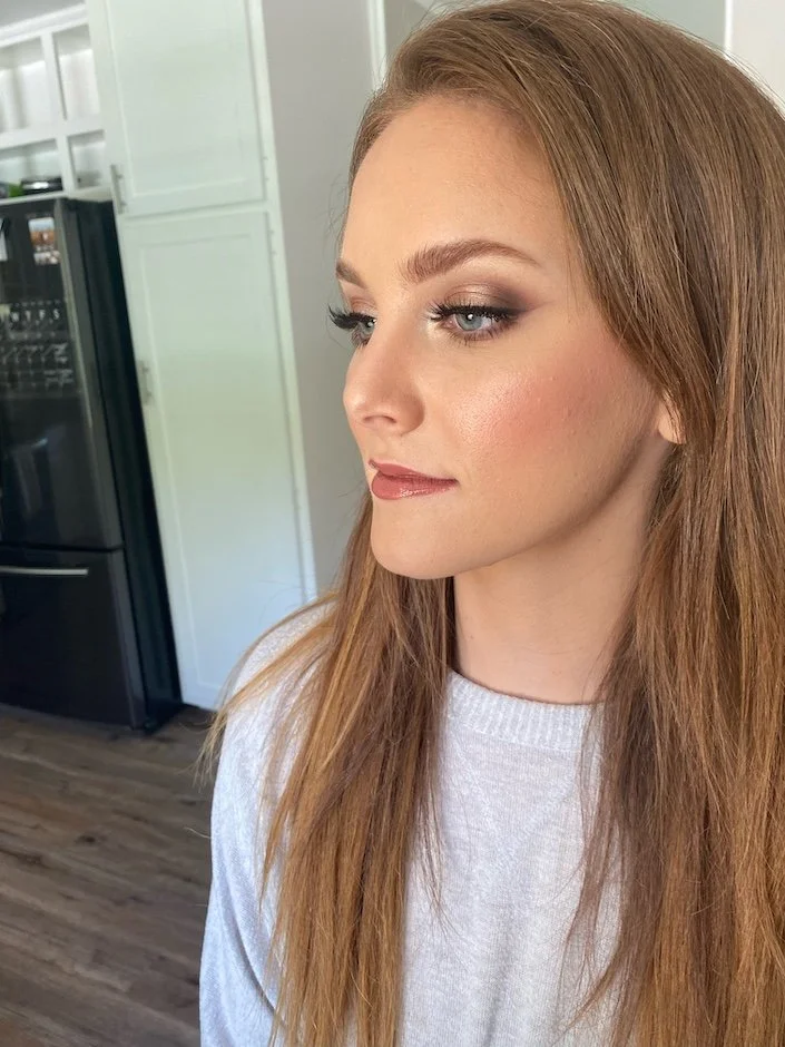 bride wearing a glam makeup look for wedding day