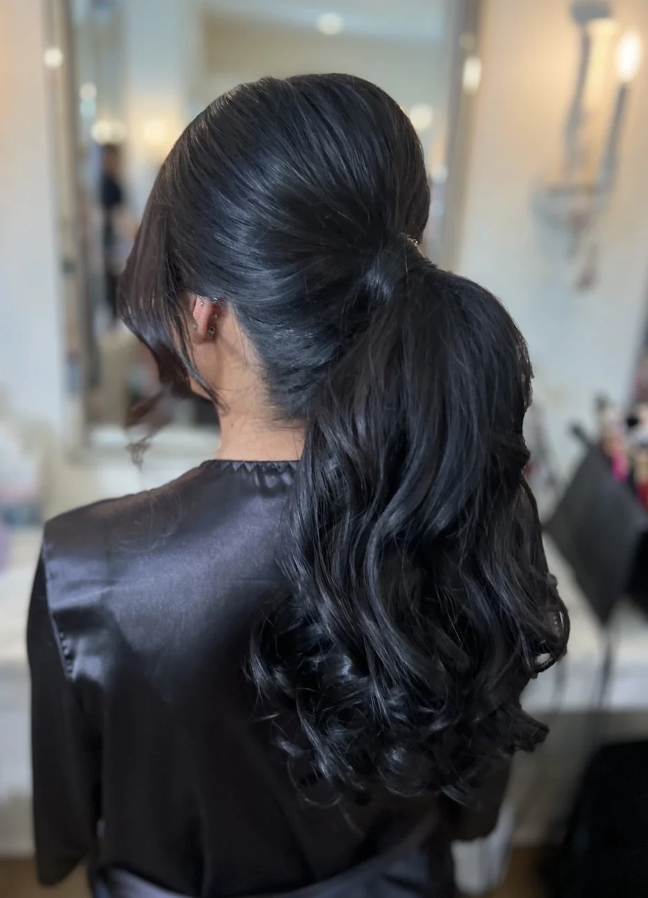 party pony hairstyle on long thick black hair