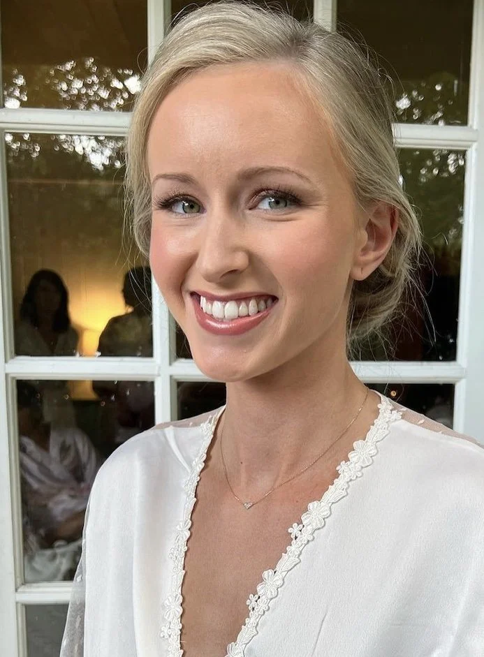 bride with blonde hair and natural wedding makeup