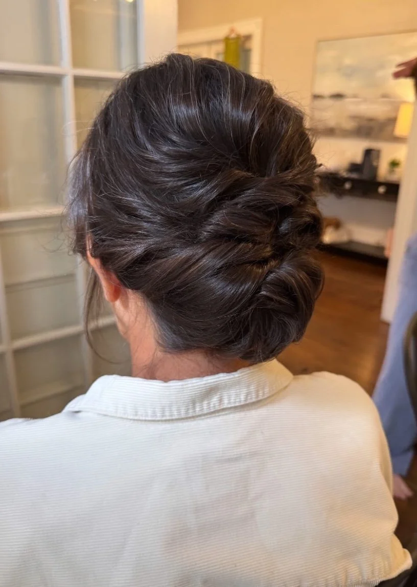 updo for the mother of the bride with short brown hair