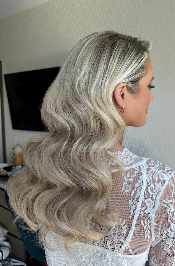 bride with platinum hair color and glam waves