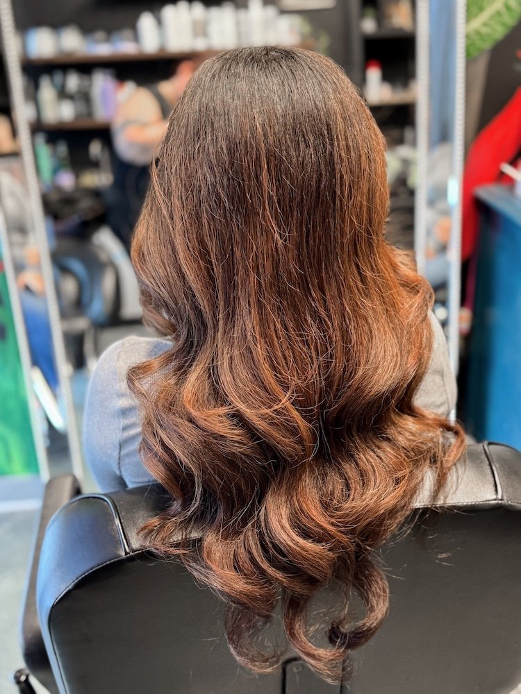 glam wave hairstyle on long brown hair