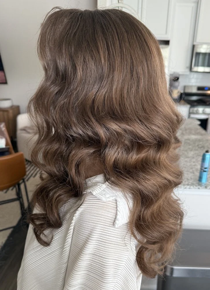 a bride with brunette glam waves