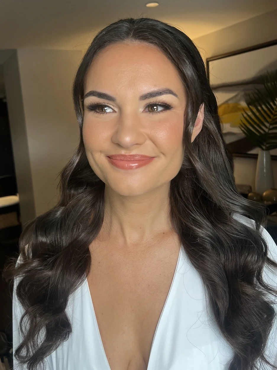 natural makeup application for a bride with tan skin brown hair and brown eyes