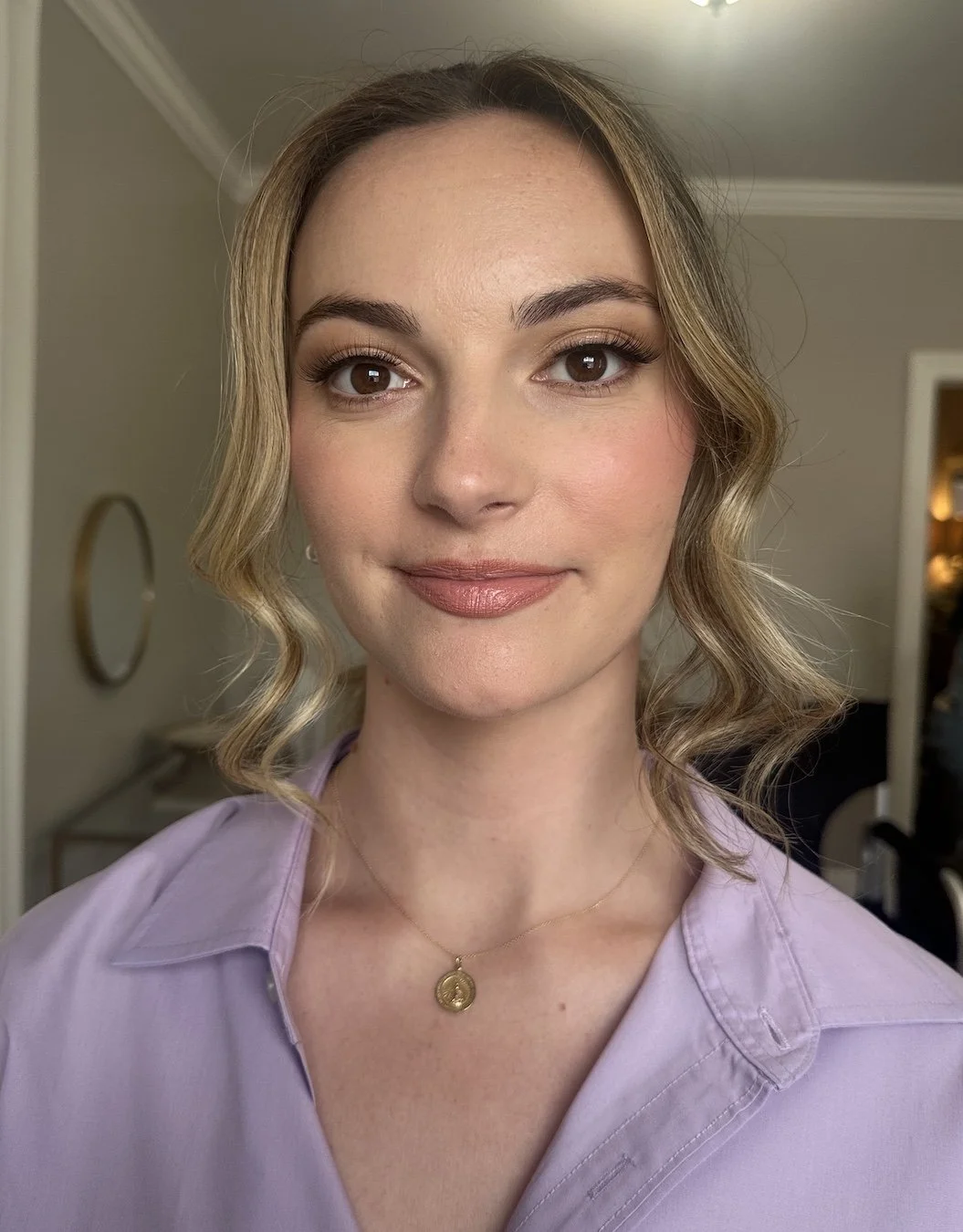 blonde bridesmaid with brown eyes and natural makeup