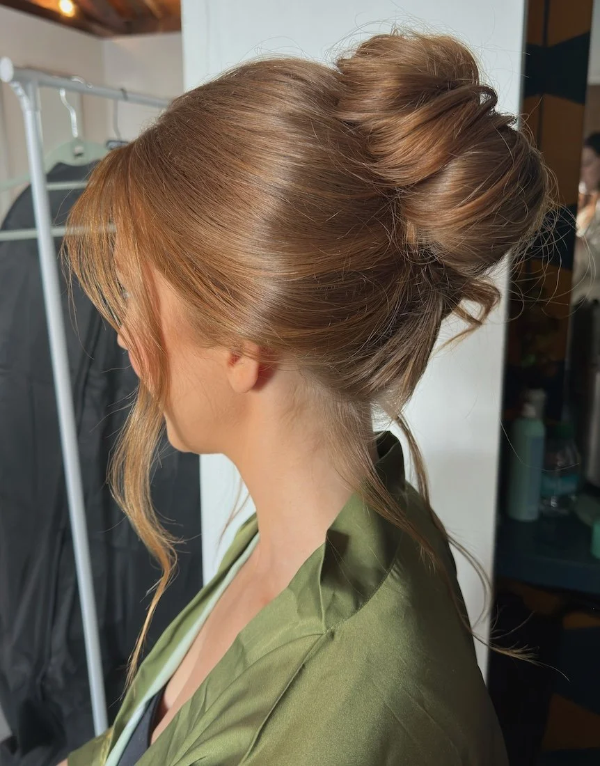 high updo hairstyle with a french twist