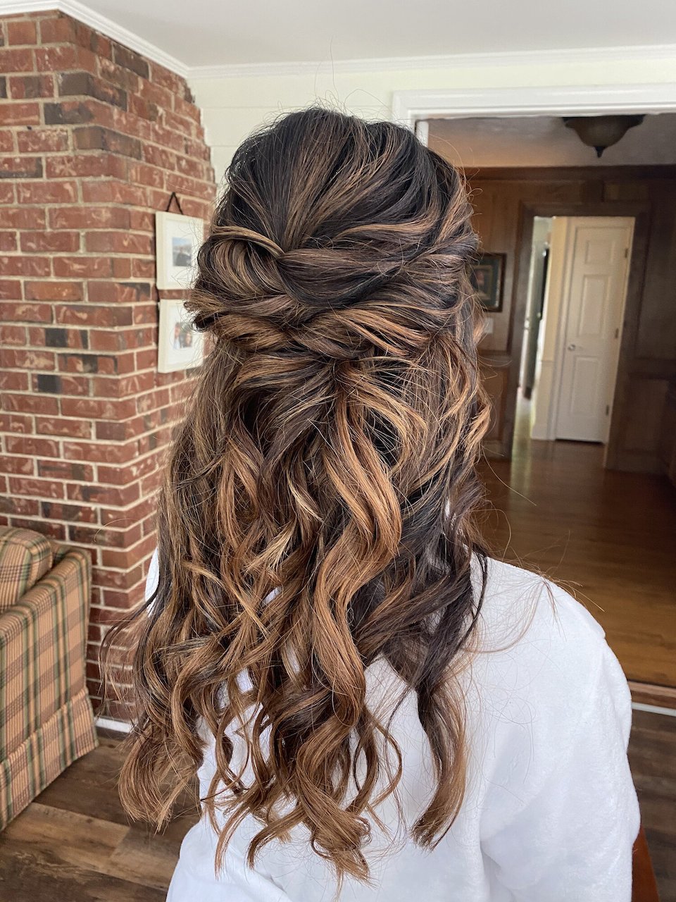 40 Best Prom Hairstyles for 2023 : Twisted Half Up Brunette Long Hair