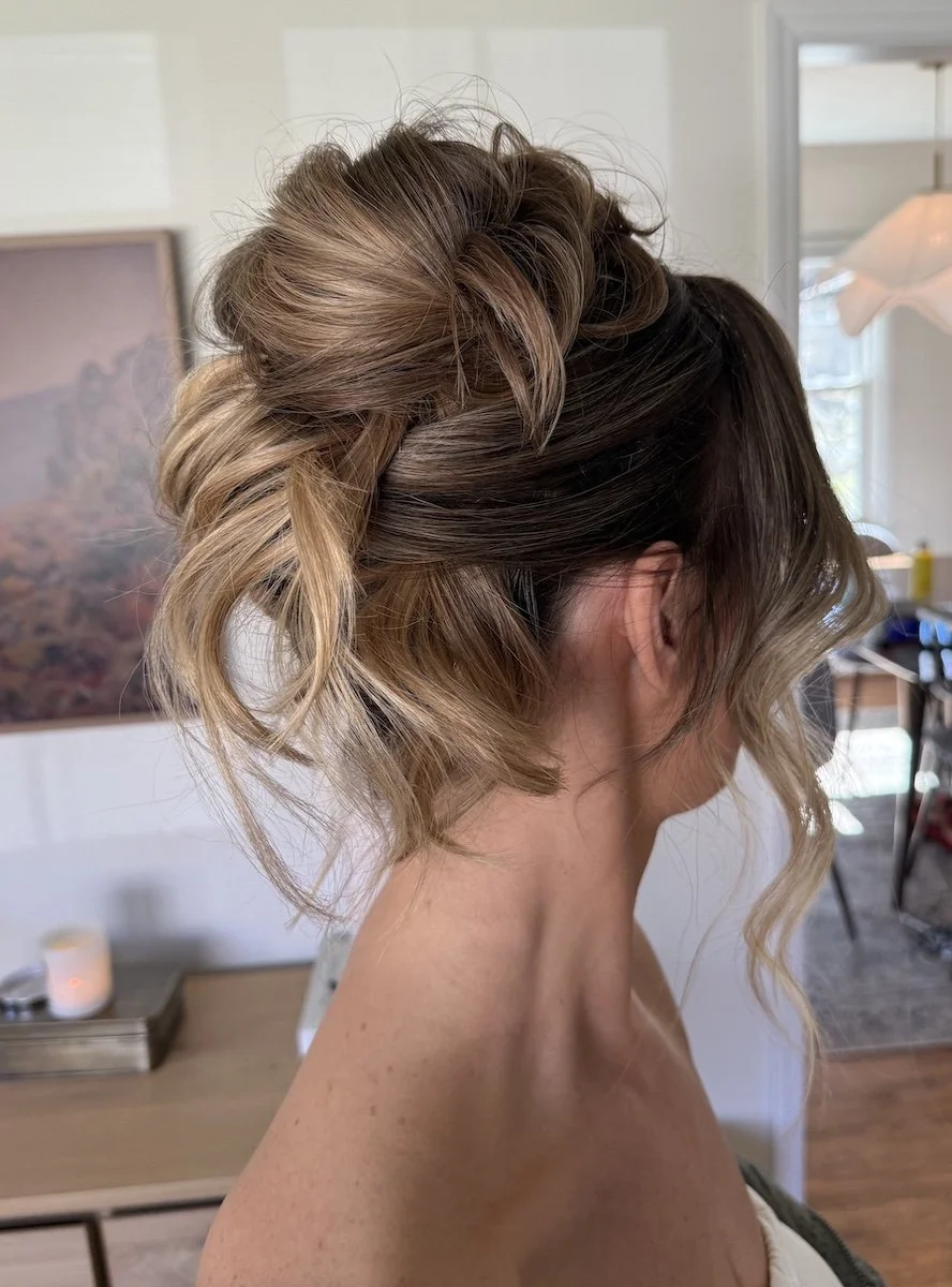 effortless modern updo and french twist on brunette hair