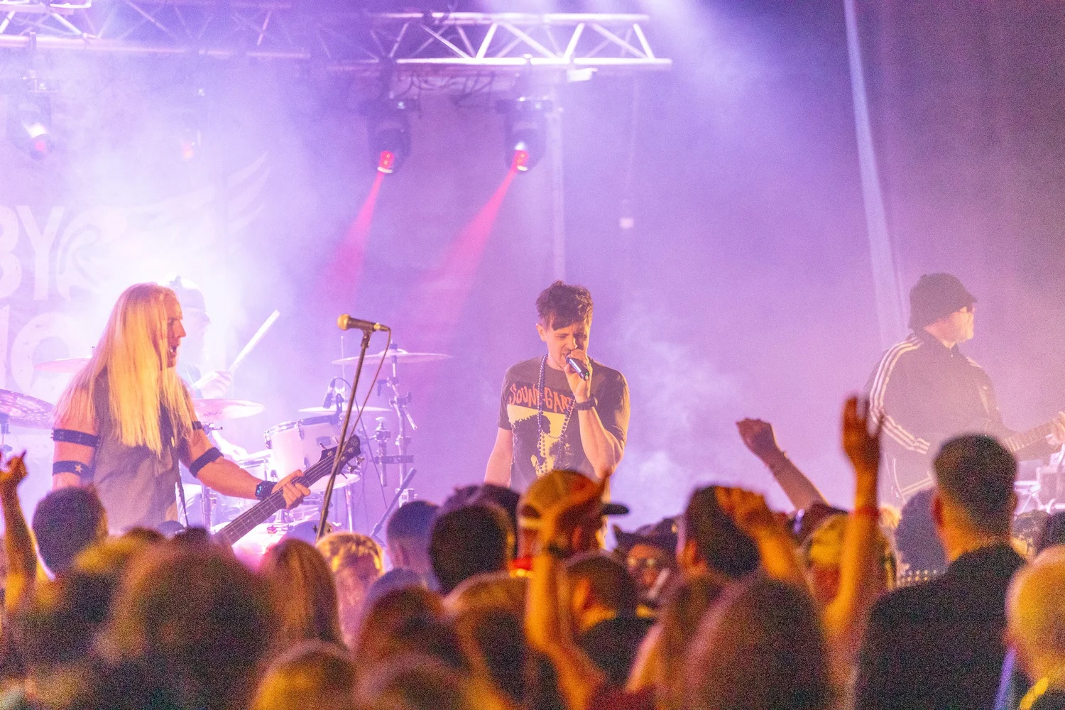 Fly By Radio performing to packed crowd