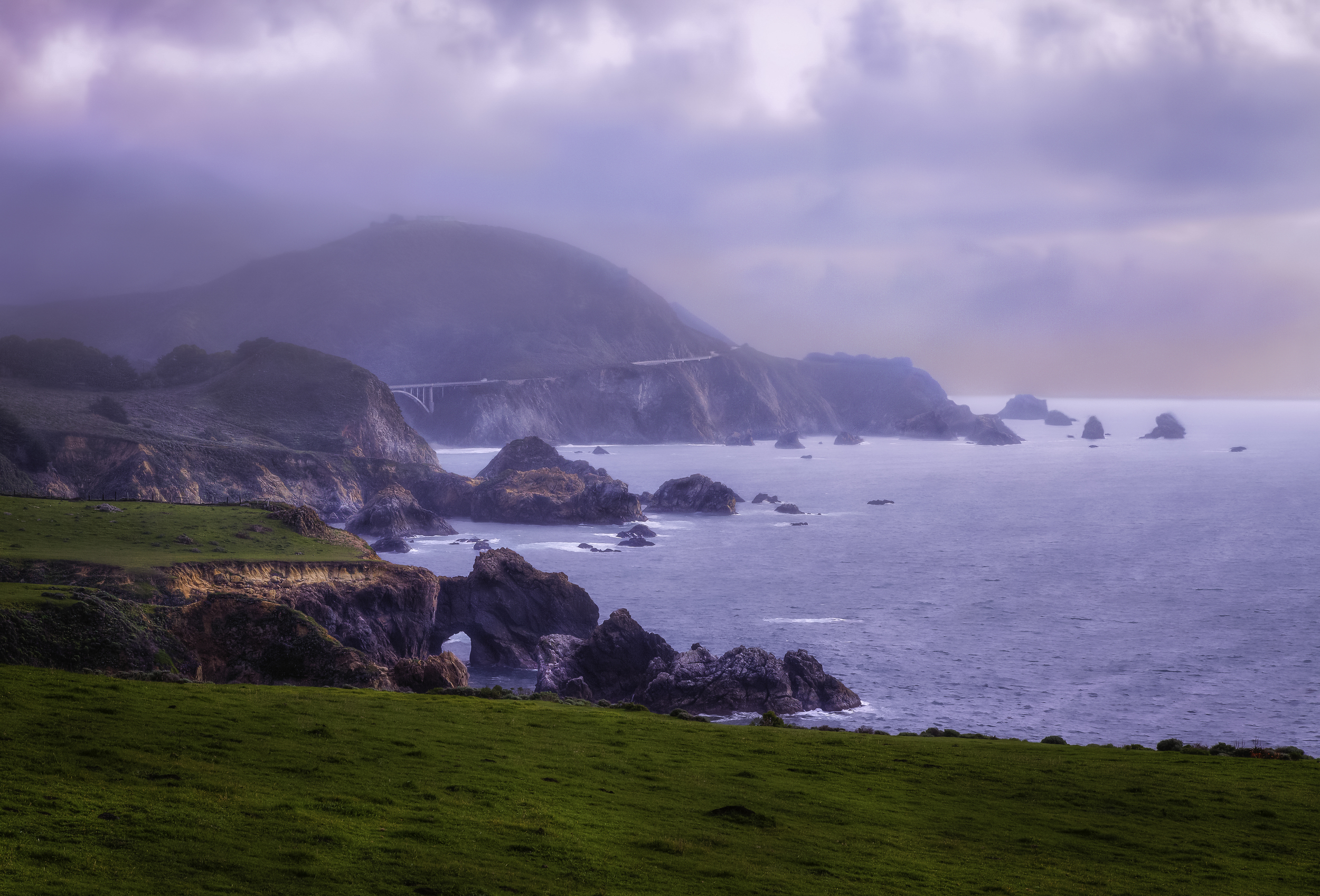 Big Sur California Coast Line With Bixby Bridge In Background With A Marine Layer