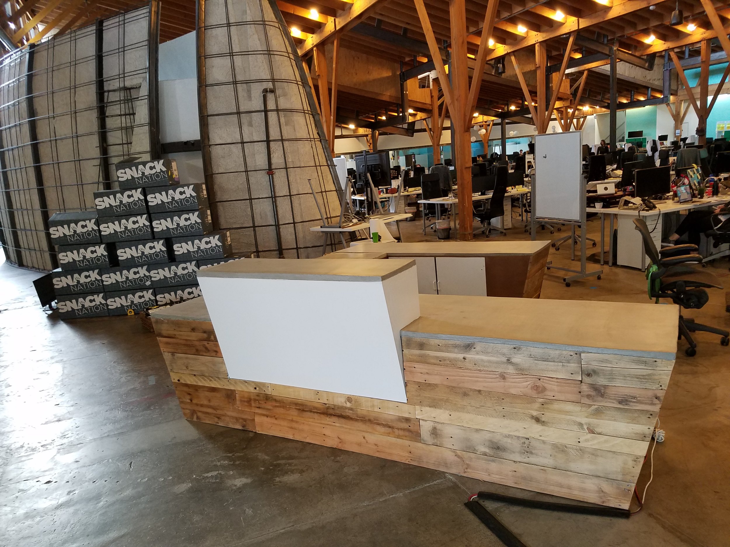 RECLAIMED WOOD AND CONCRETE RECEPTION DESK