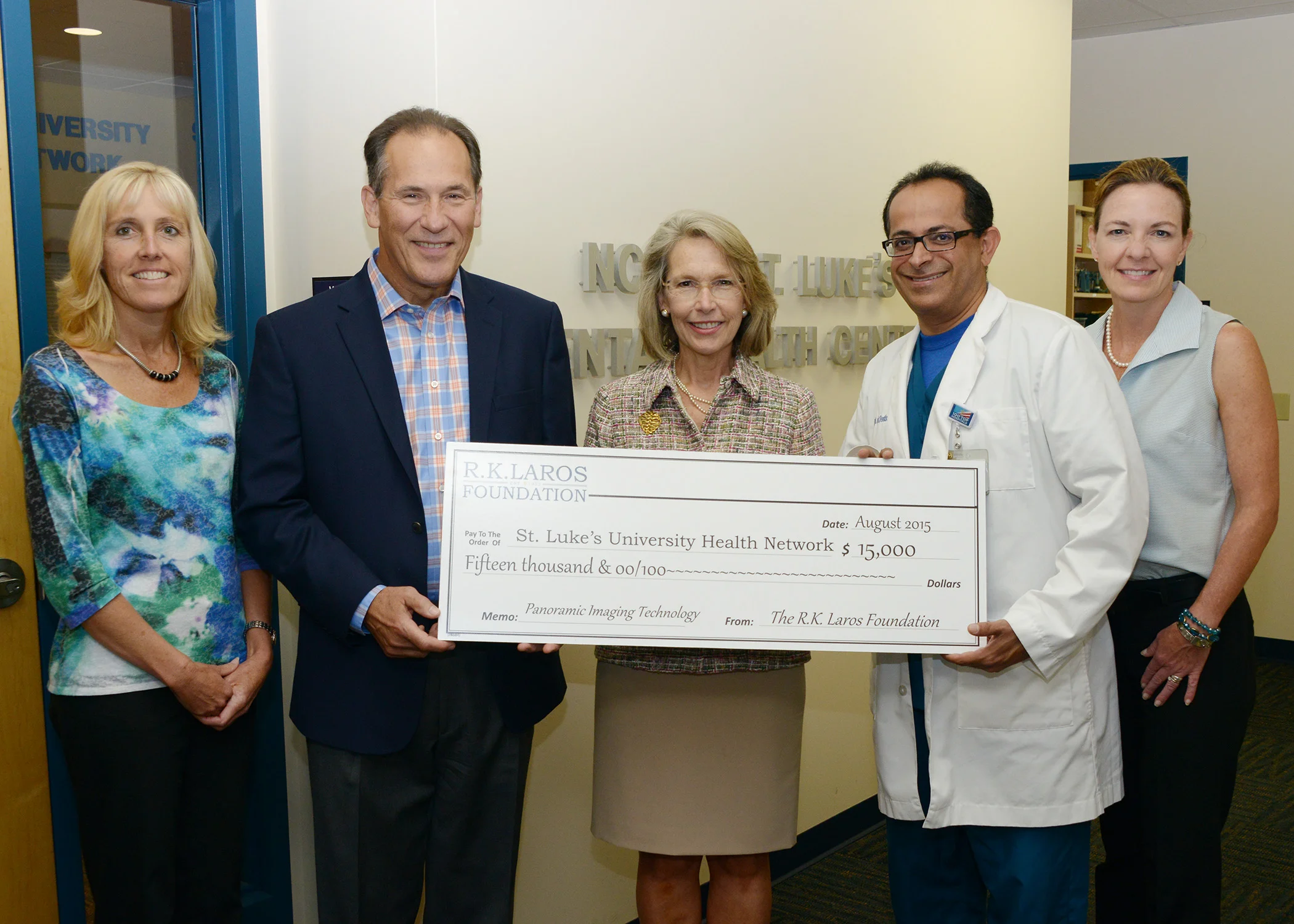 Laros Trustee Dr. Michael Abgott and Executive Director Sharon Zondag presenting the R.K. Laros grant at St. Luke's University Health Network. 