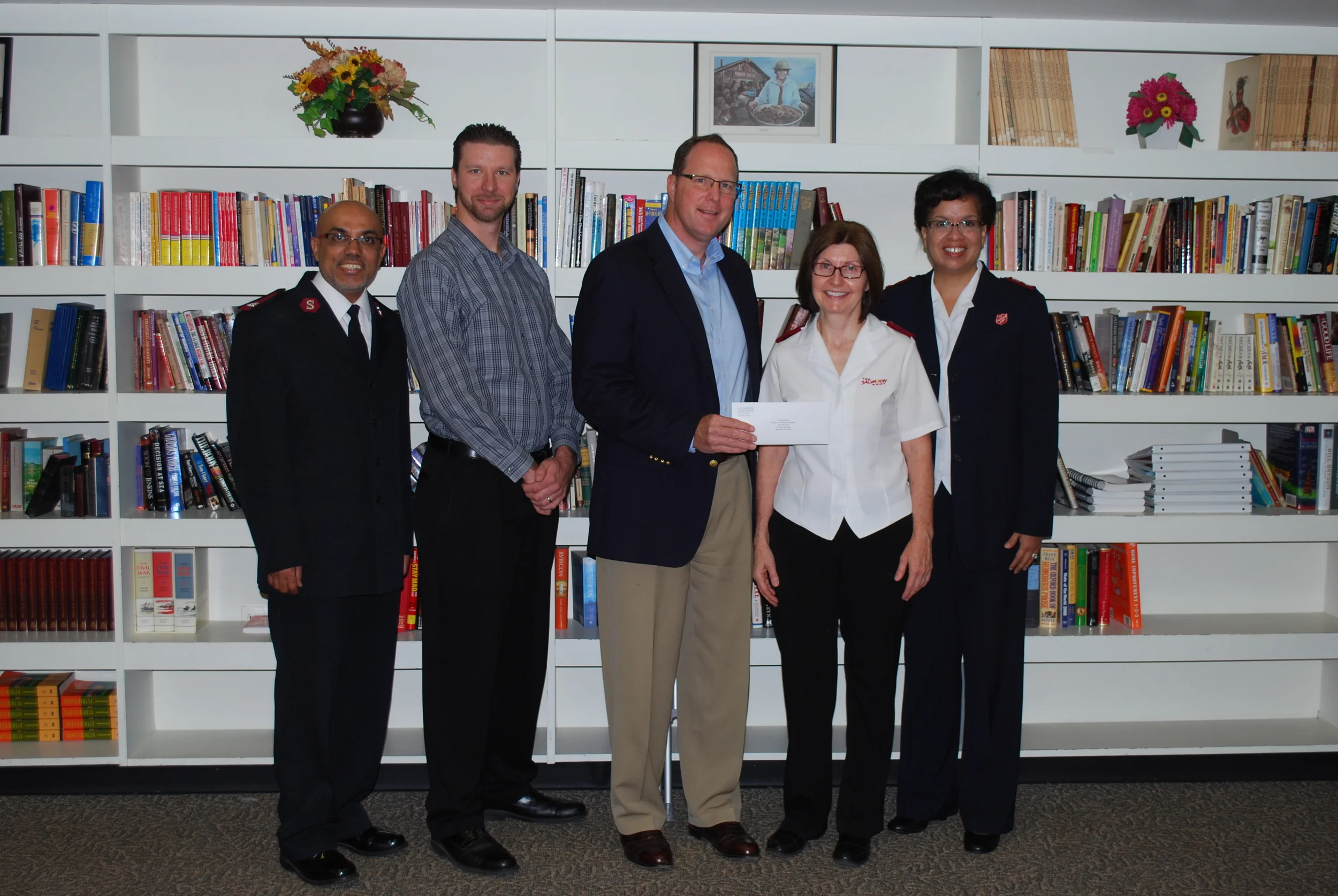 Laros Trustee Ron Madison presenting the R.K. Laros Challenge Grant at The Bethlehem Salvation Army.