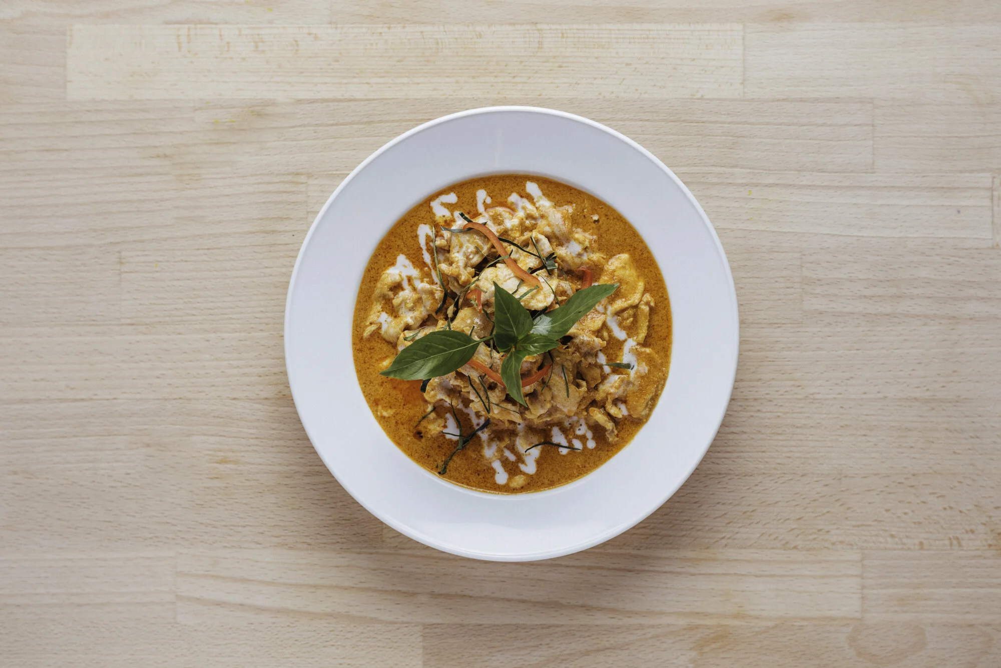   PANAENG CURRY CHICKEN (GF) - 18   chicken, coconut milk, chili, garlic, ginger, lime leaves, fish sauce, shrimp paste 