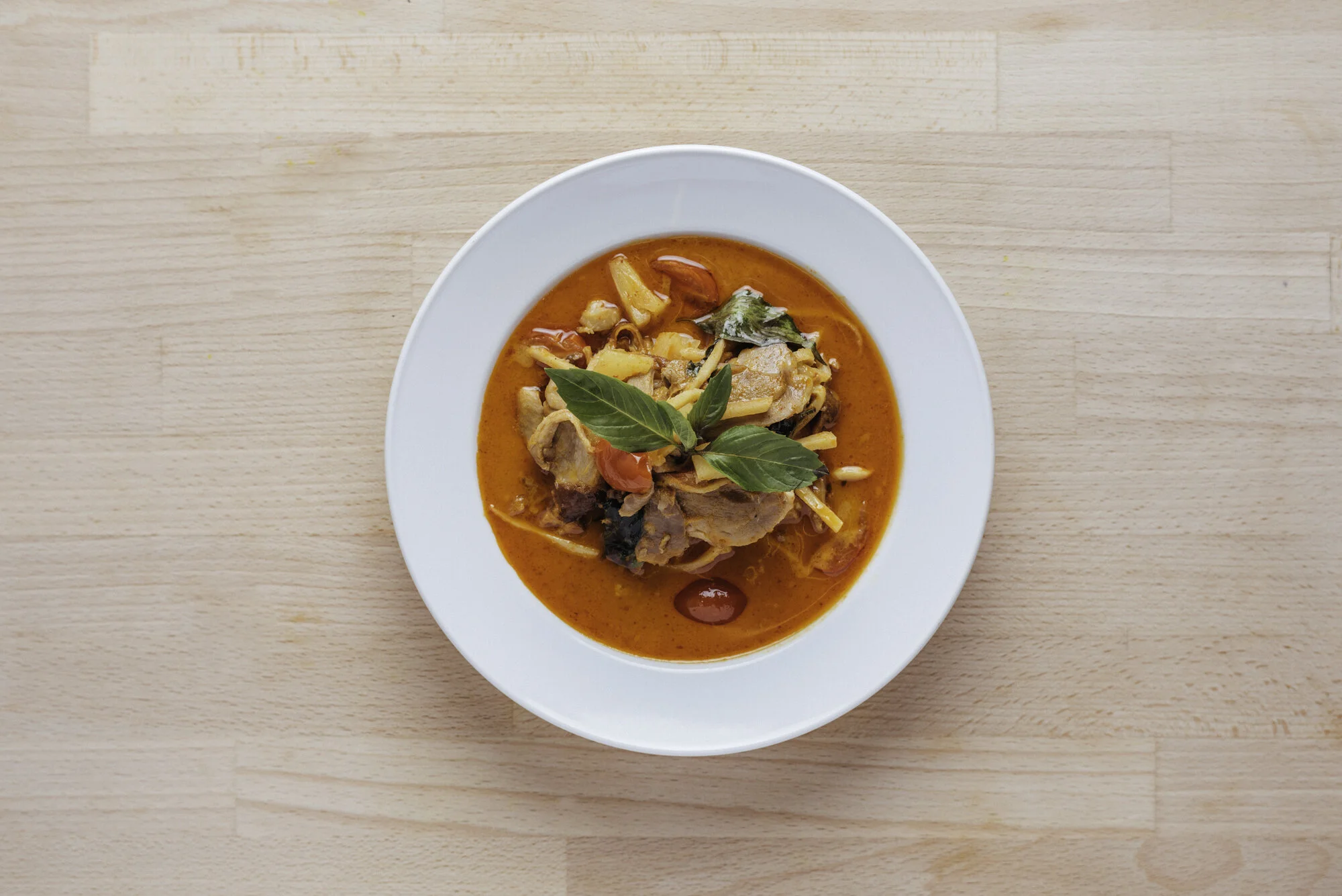   RED CURRY DUCK - 20   bbq duck, coconut milk, garlic, chili, ginger, pineapple, lime leaves, bamboo shoots, thai sweet basil, dark soy sauce, fish sauce, shrimp paste 