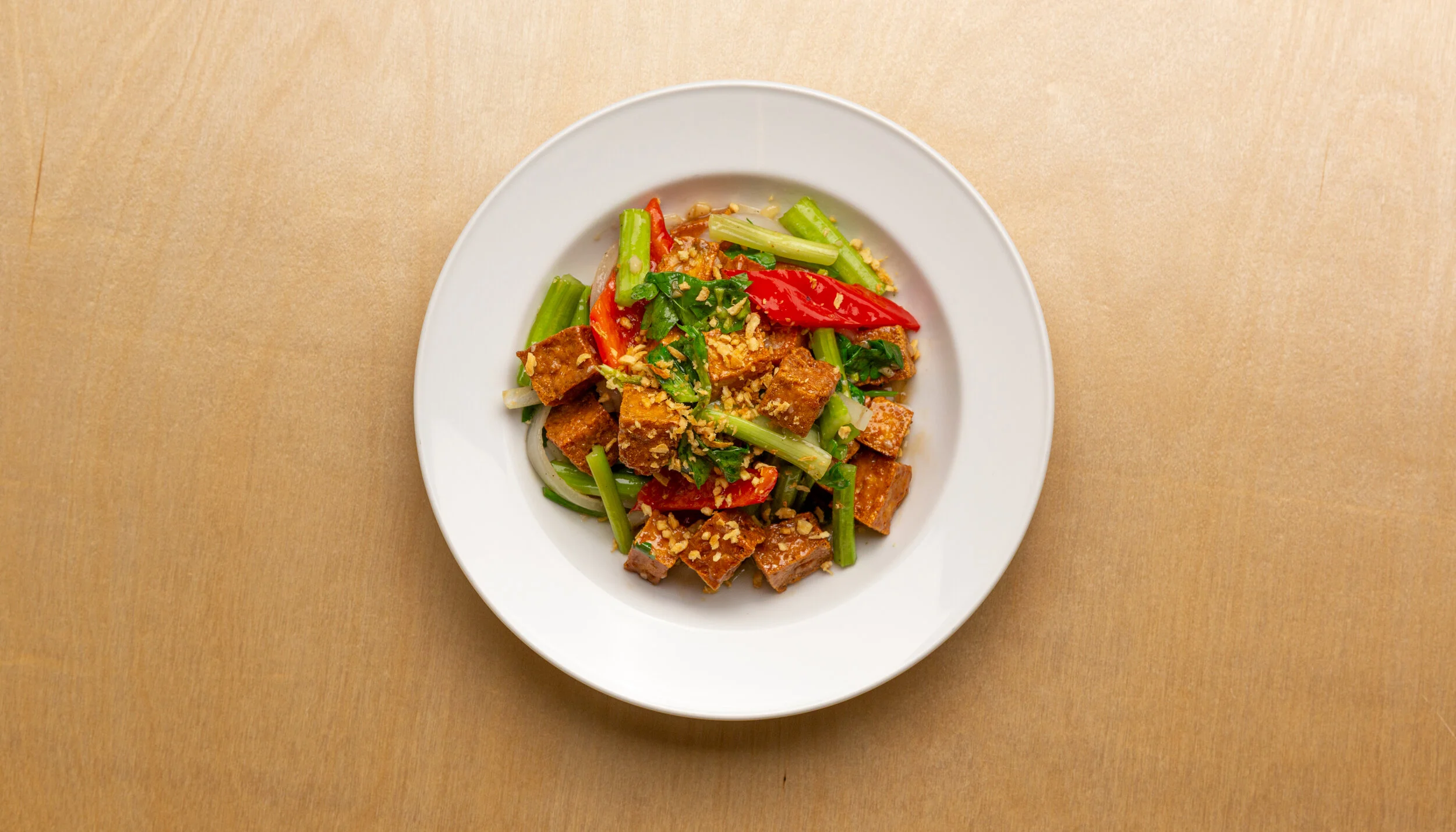   VEGAN STIR FRY - 15   fried tofu, garlic, asian celery, onion, green onion, bell pepper, mushroom soy sauce, mushroom oyster sauce and sesame oil.  Sorry no substitutes or modifications.  