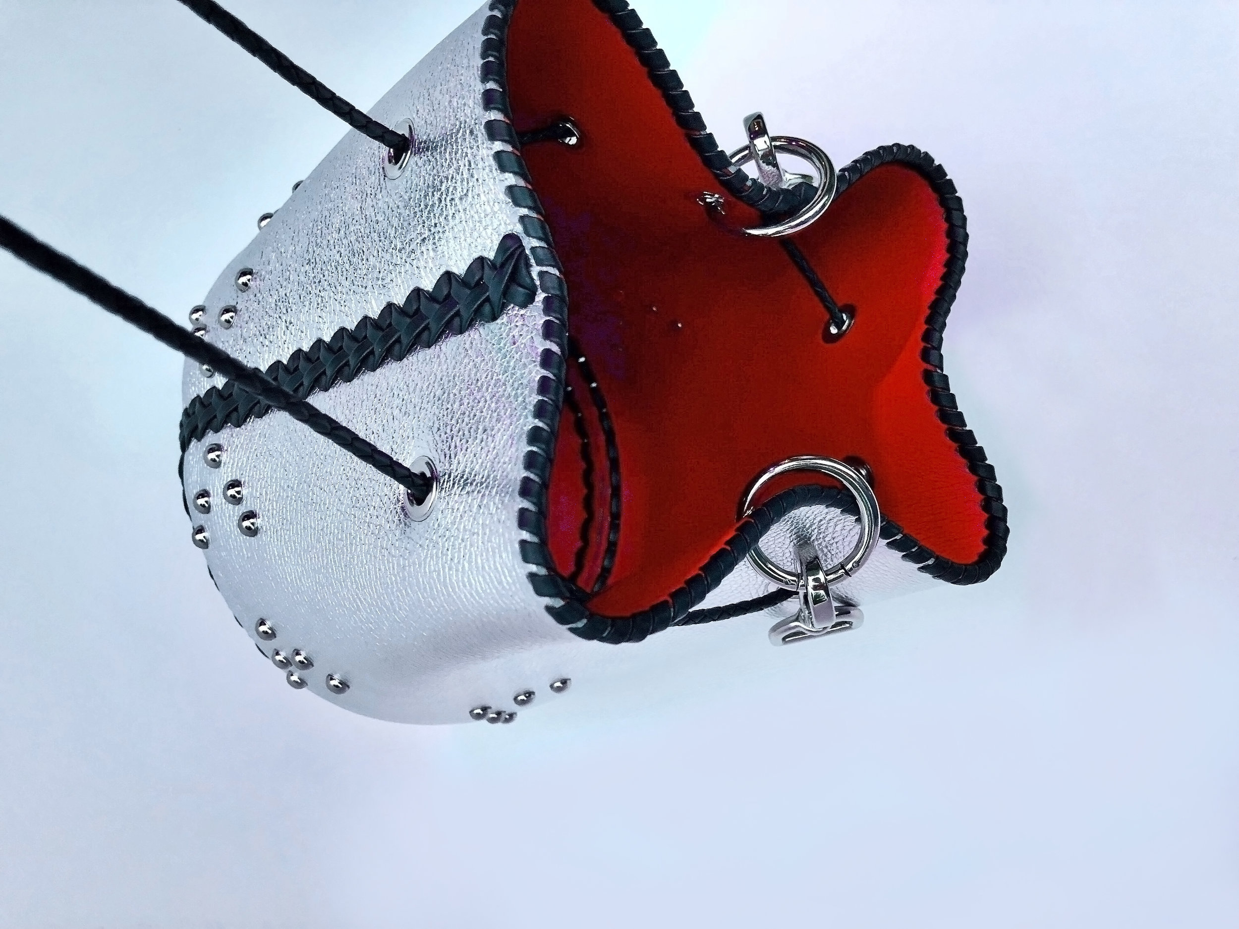 Silver handbag lined in vampire red leather