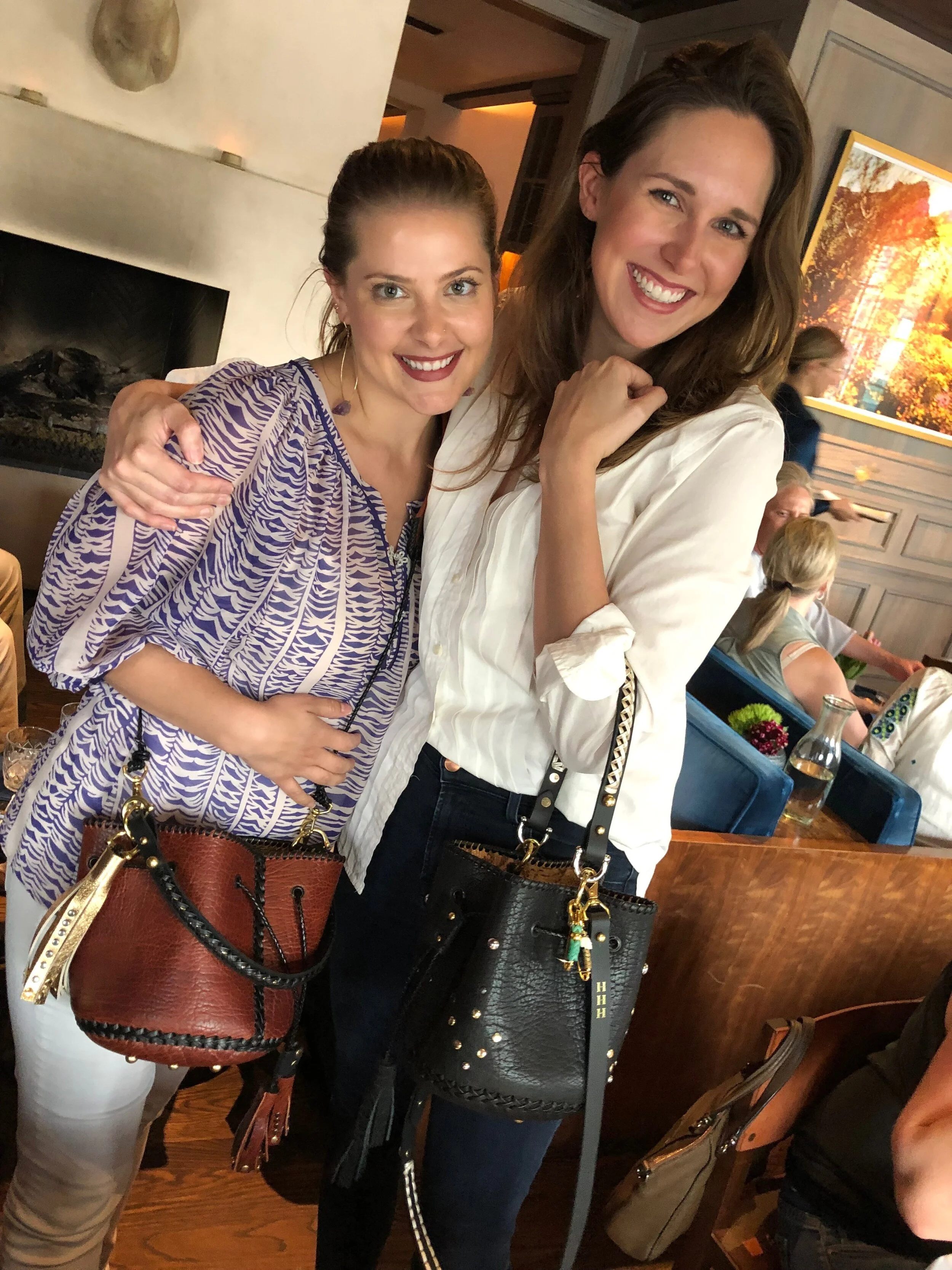 Tia and Hannah with their custom Jessy Made bags.