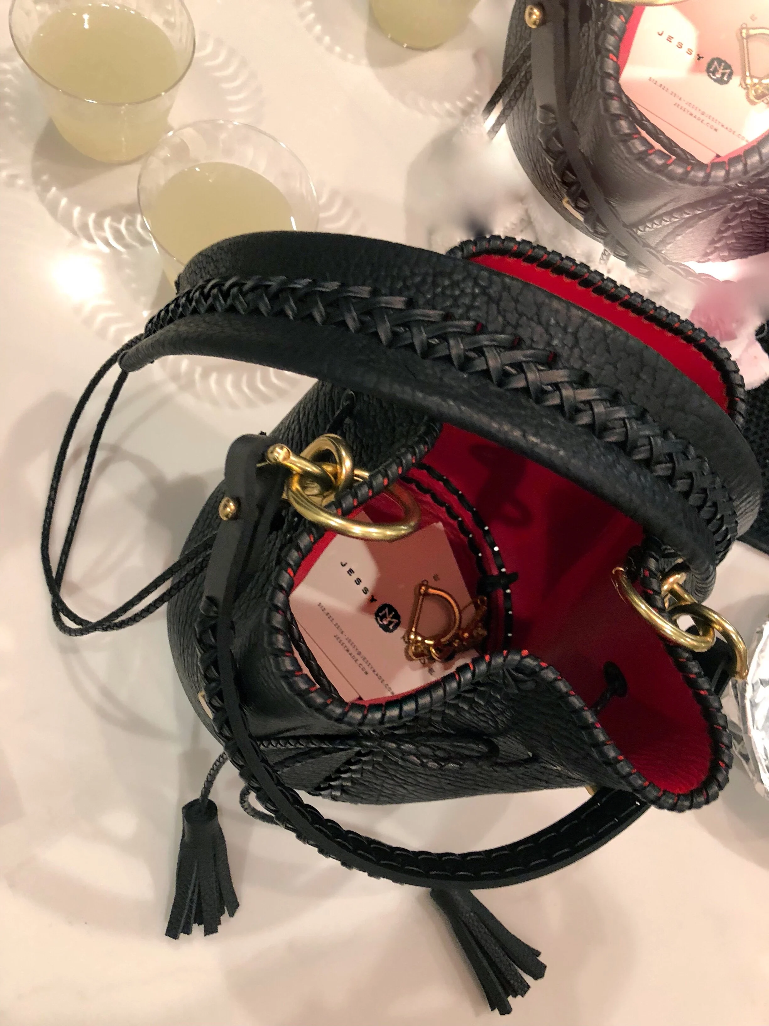 Custom black bison bucket lined in vampire red for Amy.