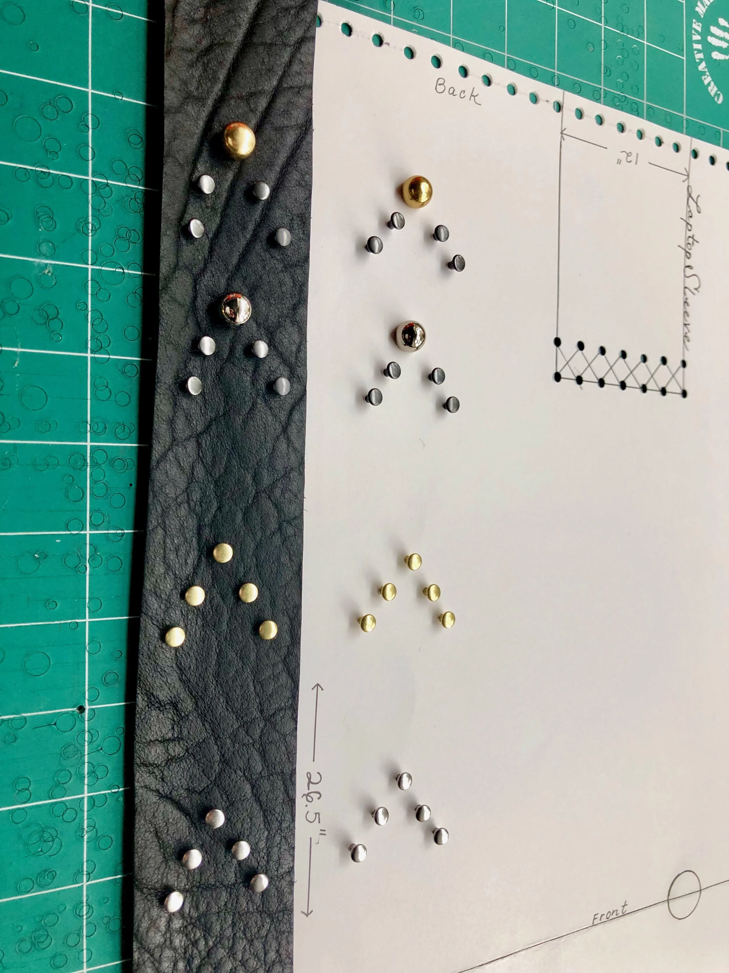 Stud patterns for a custom bucket bag.