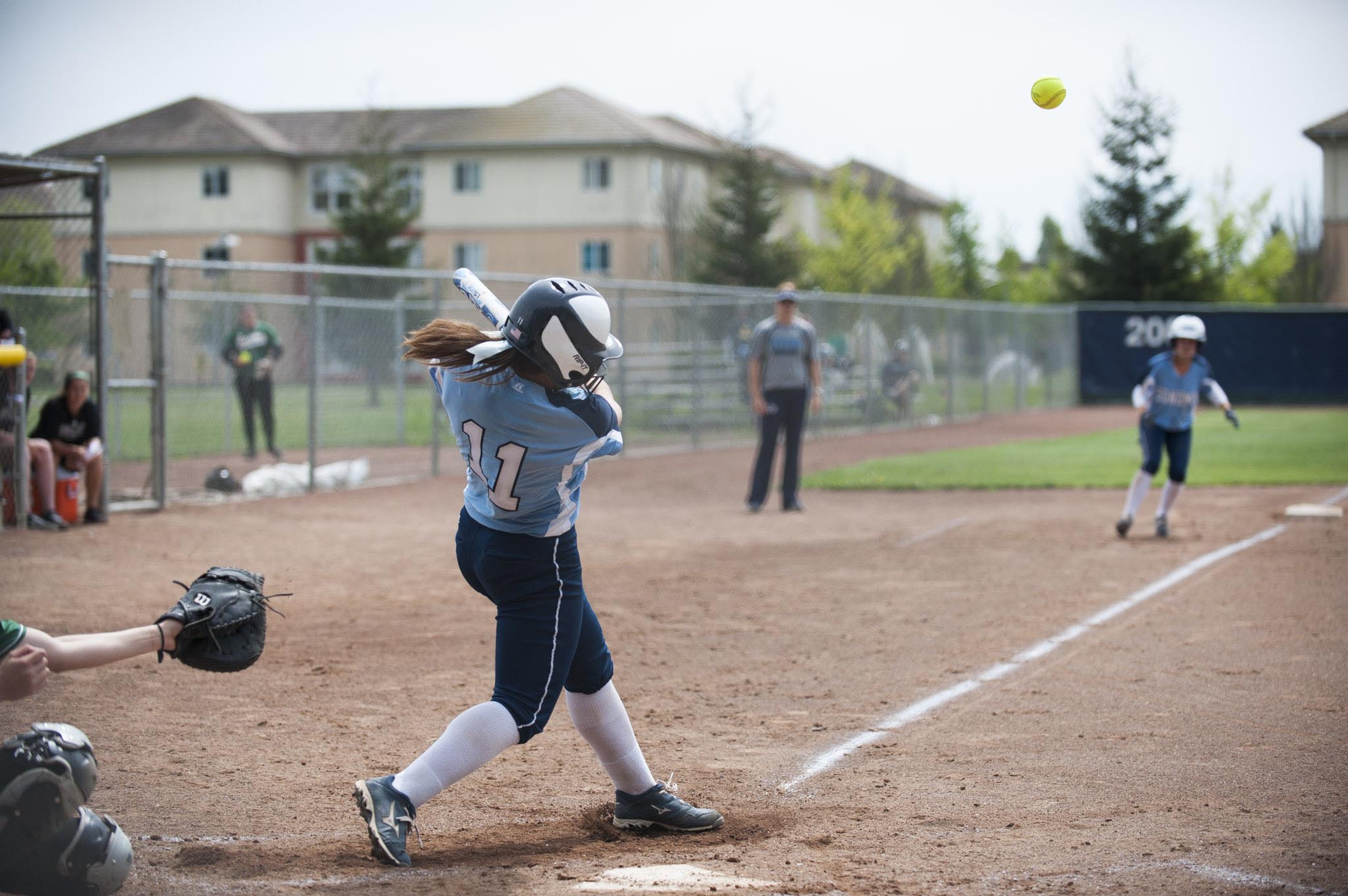 STAR // Connor Gibson Left, Keisi Chinen scored an RBI single in the first inning. Right, Amanda Llerena gave up two runs on six hits in four and two-thirds innings.