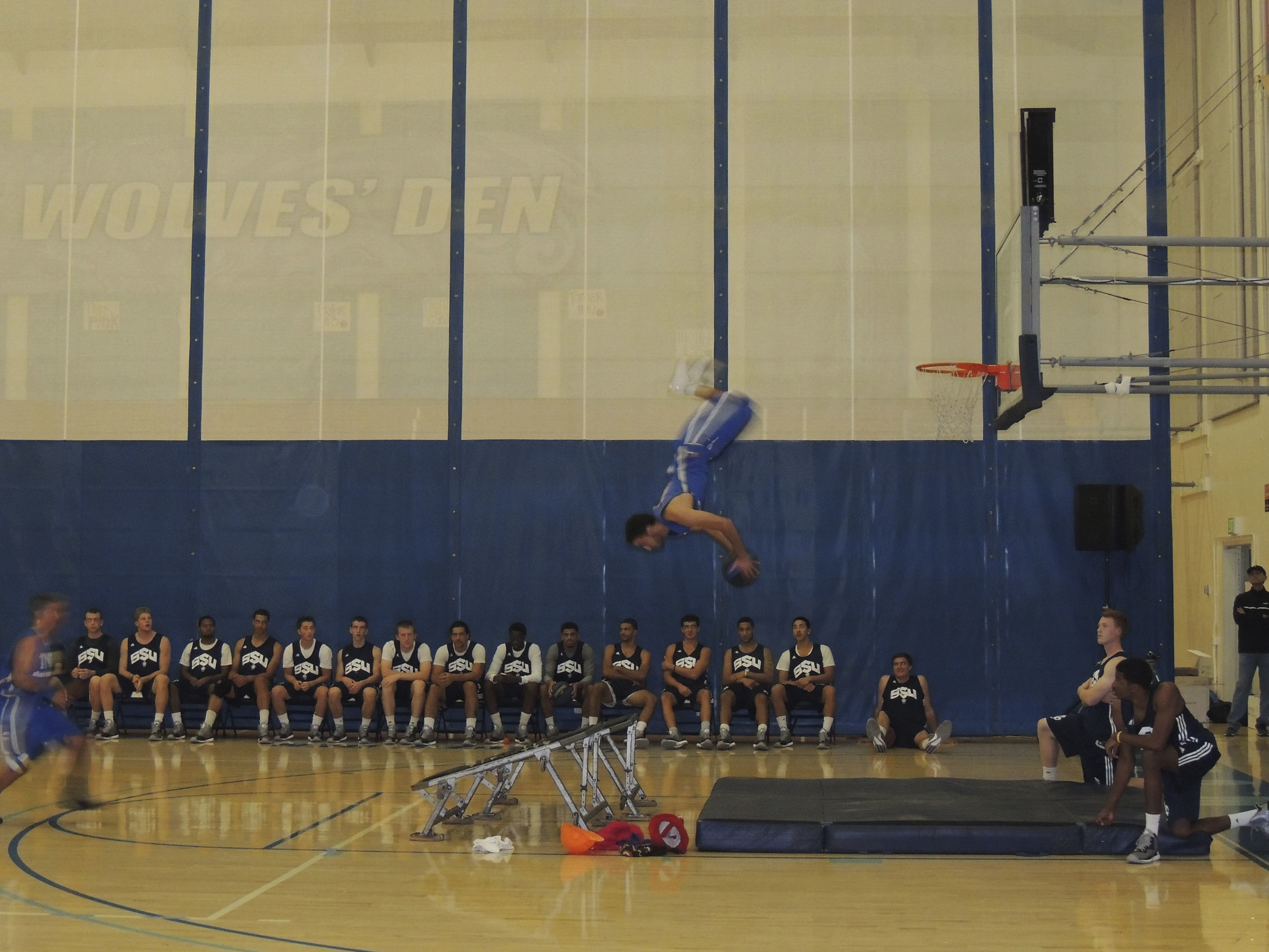STAR // Alyssa James Left, over 1,000 students and faculty were in attendance for Midnight Madness. Right, the main attraction of the night was the TNT dunk squad.