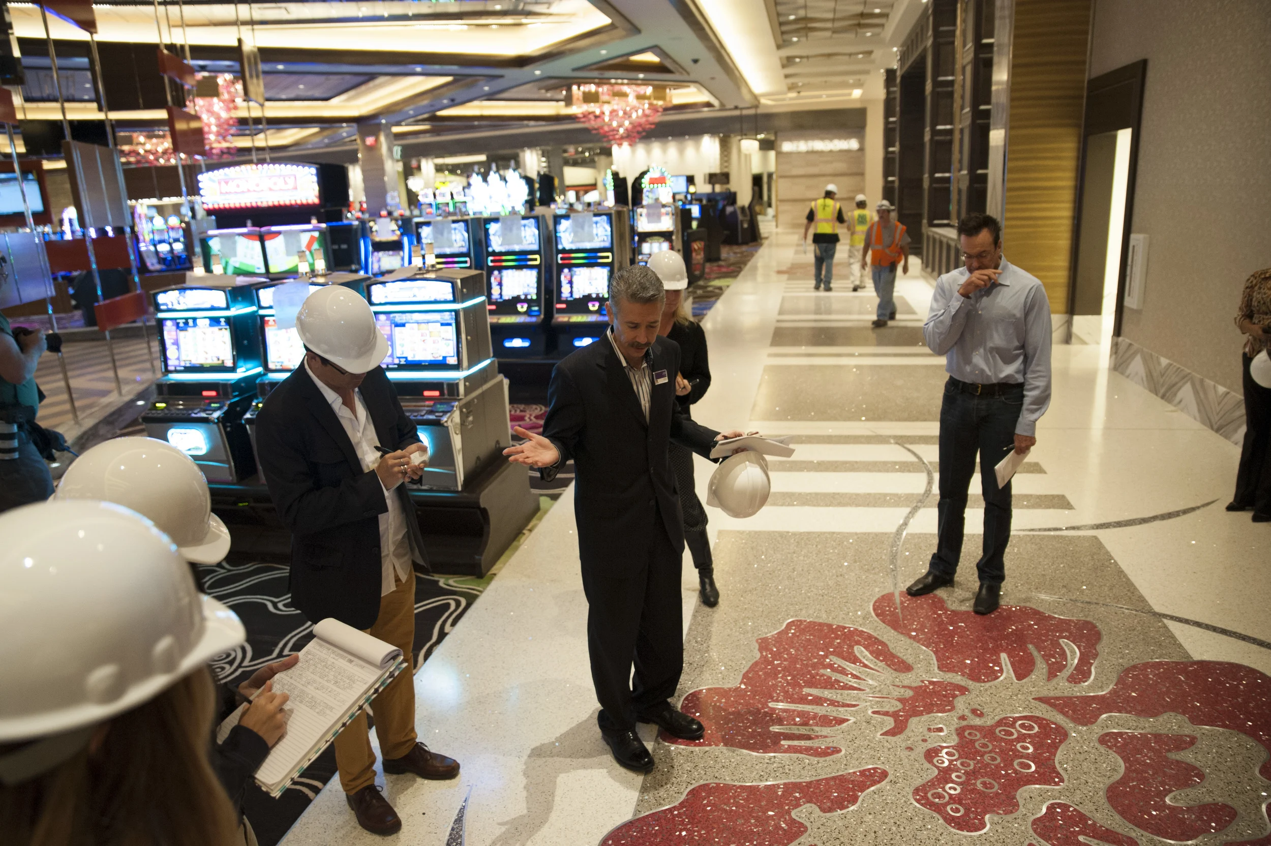 STAR // Connor Gibson Joe Hasson (center), general manager of Graton Casino and Rancheria, explains the detail of the casino’s walkway with Tribe Chairman Greg Sarris (right).
