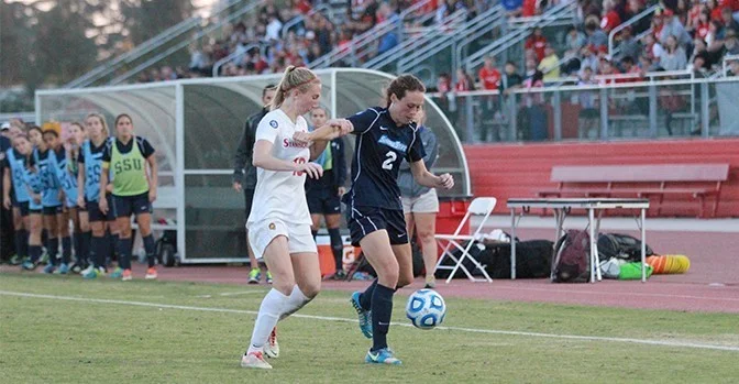 sonomaseawolves.com Left, Forward Cara Curtin got off three shots in the CCAA Championship. Right, Gabby Squarcia after her go-ahead goal in double overtime.